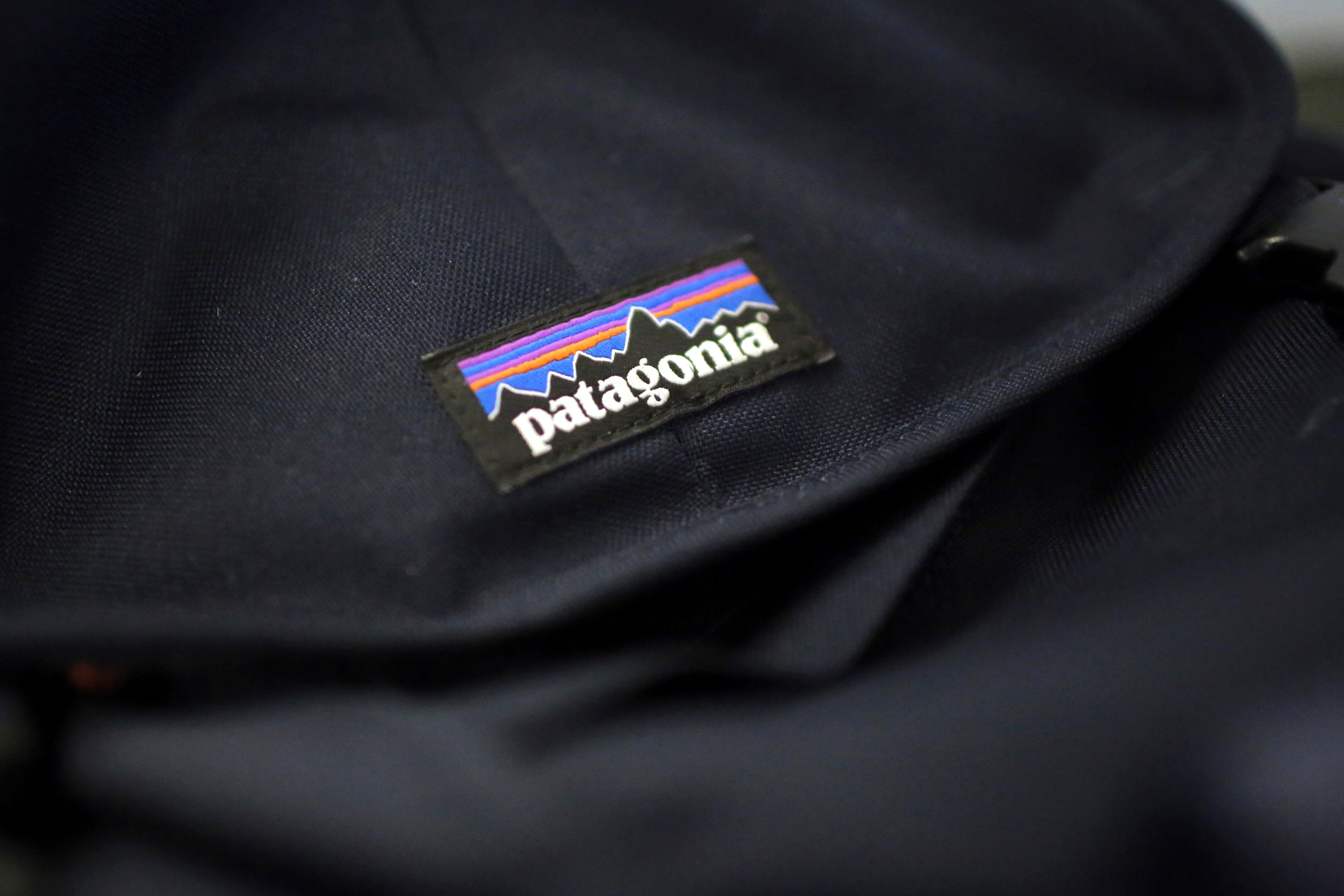 A Patagonia logo is sewn on a backpack Wednesday, Nov. 28, 2018, in New York. Patagonia Inc. is cracking down on the corporate logo vests when it comes to companies in financial sectors and other industries. (Wong Maye-E—AP)