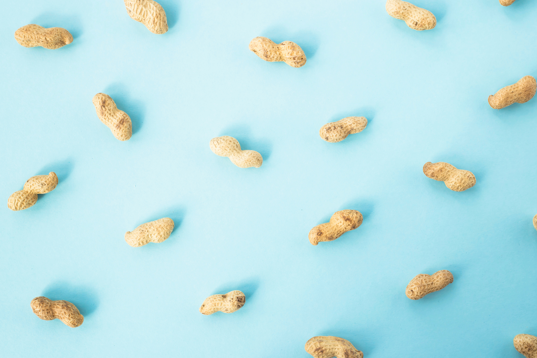 Peanuts against blue background