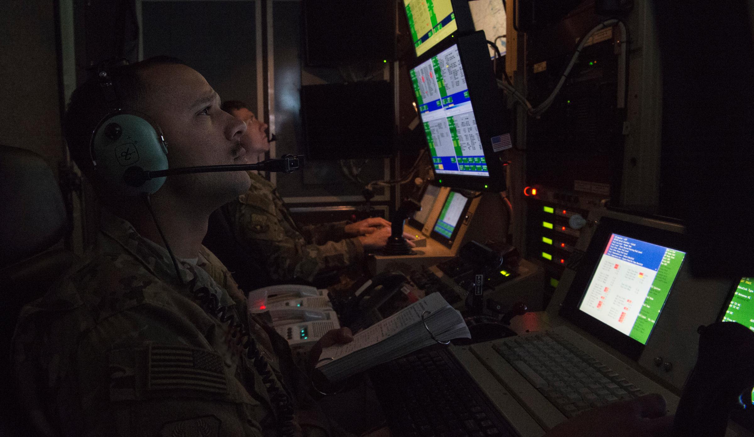 Capt. Derrick, 46th Expeditionary Attack Squadron pilot, and Staff Sgt. Marcus, 46th EATKS MQ-9 sensor operator, check aircraft system operations during preflight of an MQ-9 Reaper at an undisclosed location in Southwest Asia