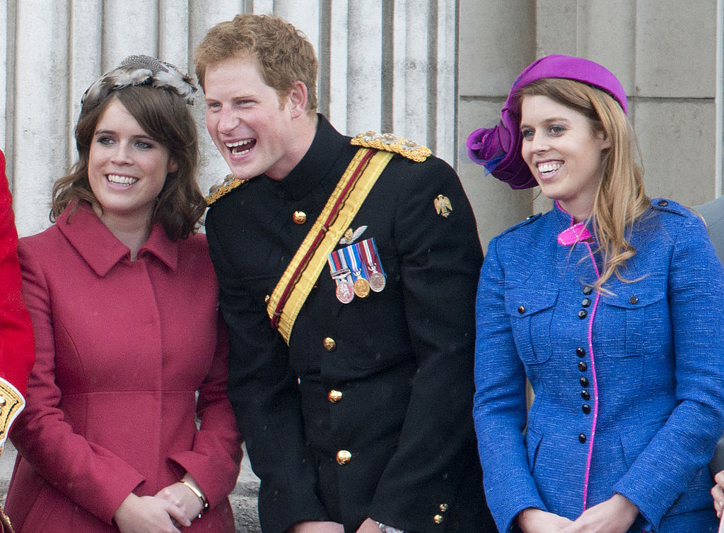 Princess Beatrice, Prince Harry and Princess Eugenie during Trooping The Colour in London on June 16, 2012. (Mark Cuthbert—UK Press via Getty Images)