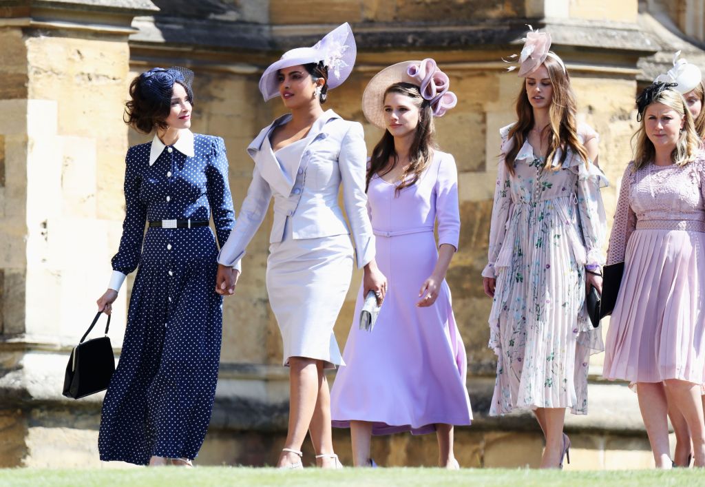 Abigail Spencer (L) and Priyanka Chopra (2L) arrive for the wedding ceremony of Britain's Prince Harry, Duke of Sussex and US actress Meghan Markle at St George's Chapel, Windsor Castle, in Windsor, on May 19, 2018. (Chris Jackson—AFP/Getty Images)