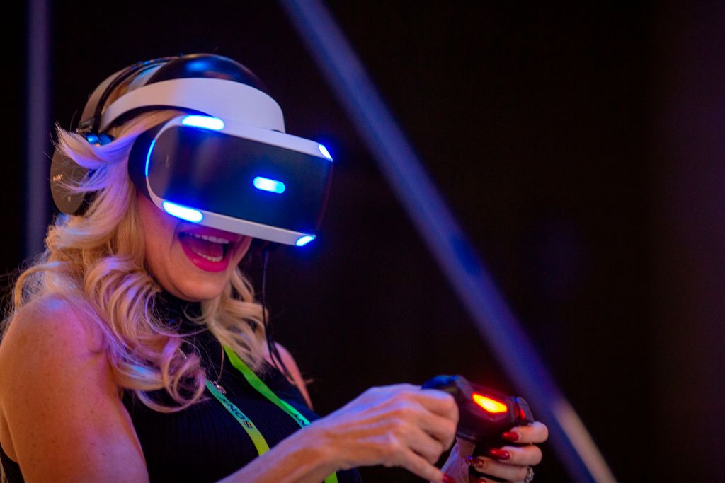 A woman plays ASTRO BOT Rescue Mission at a Playstation VR display at the Sony Exhibit at the Las Vegas Convention Center during CES 2019 in Las Vegas on January 9, 2019. (DAVID MCNEW&mdash;AFP/Getty Images)
