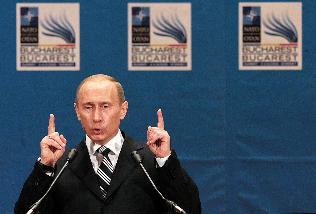 Russian President Vladimir Putin talks during a press conference after the NATO-Russia Council meeting at the Parliament in Bucharest, Romania, on April 4, 2008. (Natalia Kolesnikov - AFP/Getty Images)