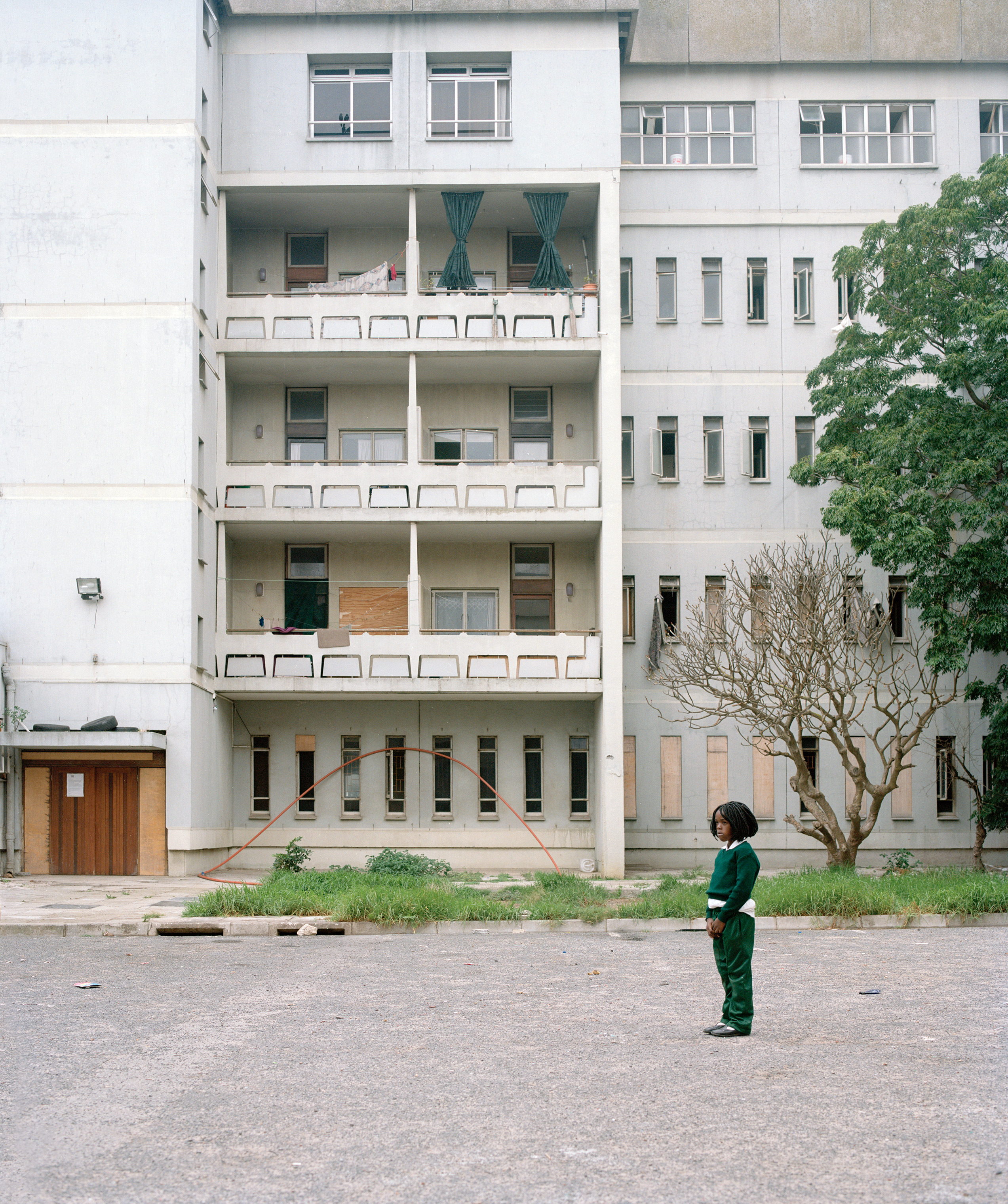 Outside an abandoned nurses’ residence in Cape Town, which is currently occupied by homeless or evicted families. (Sarah Nankin for TIME)
