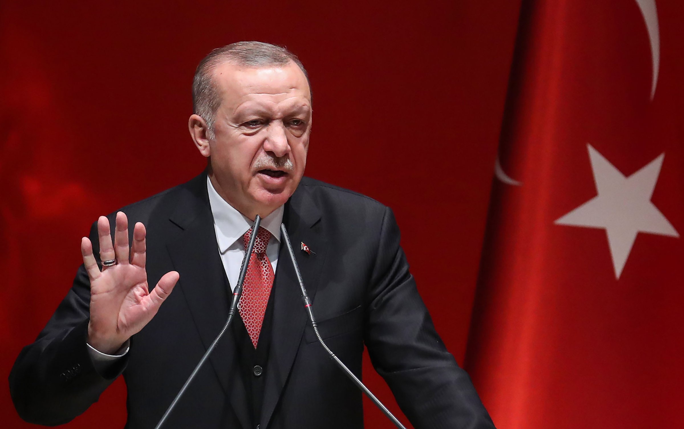 Turkish President Tayyip Erdogan addresses election officials on Jan. 29