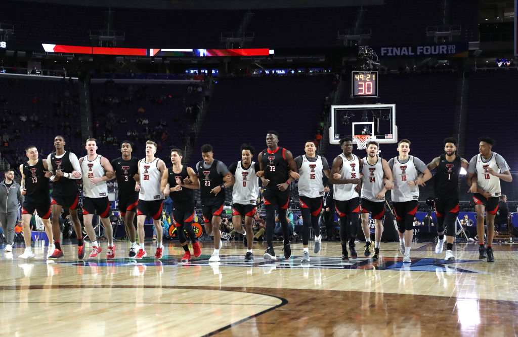 The Texas Tech Red Raiders run the court with linked arms during practice prior to the 2019 NCAA men's Final Four at U.S. Bank Stadium on April 5, 2019 in Minneapolis, Minnesota. (Streeter Lecka—Getty Images)