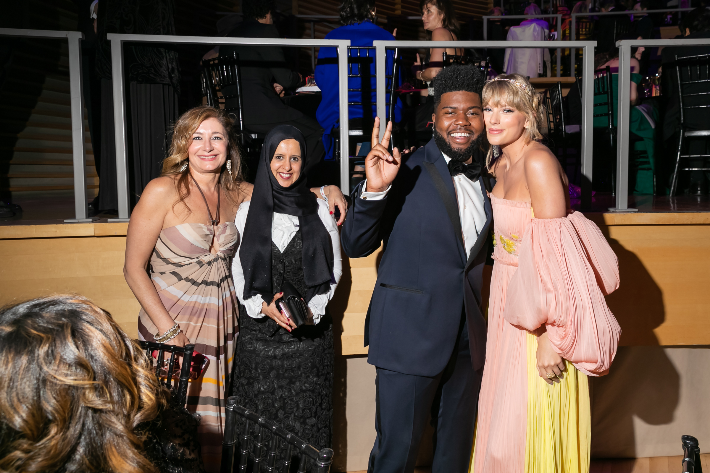 Sarah Leah Whitson, Radhya al-Mutawakel, Khalid and Taylor Swift at the Time 100 Gala at Jazz at Lincoln Center in New York City on April 23, 2019. (Kevin Tachman for TIME)