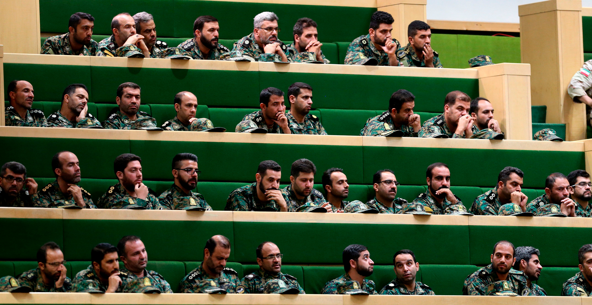 Members of the Iranian Revolutionary Guard Corps listen to a speech in parliament in Tehran on Oct. 7, 2018. (Atta Kenare—AFP/Getty Images)