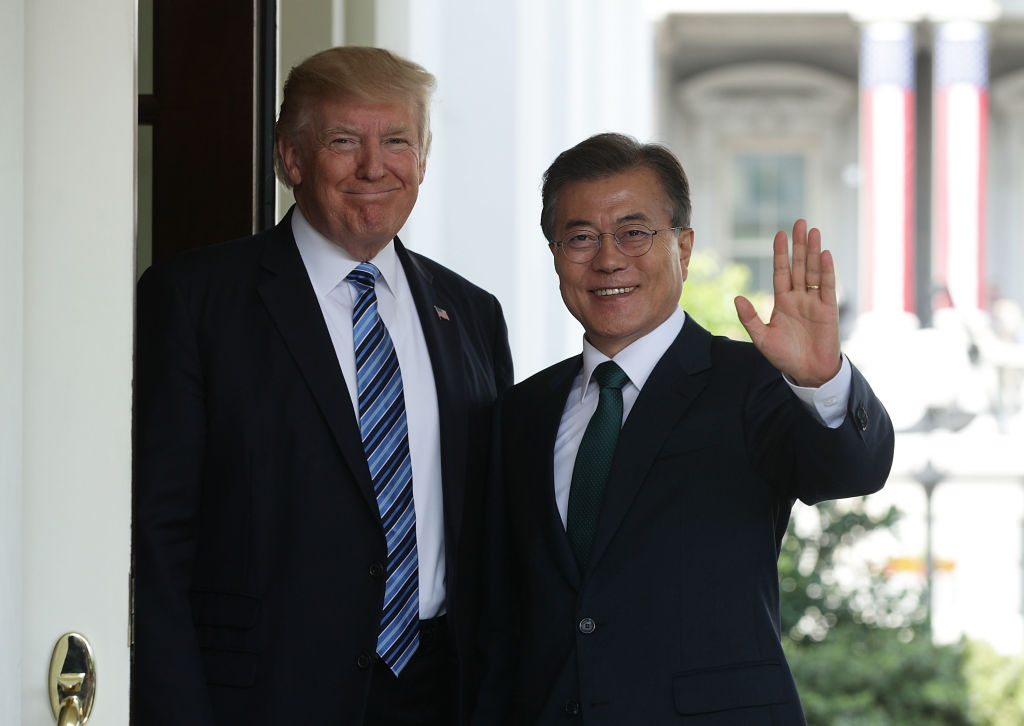 U.S. President Donald Trump (L) welcomes South Korean President Moon Jae-in (R) during an arrival outside the West Wing of the White House in Washington, D.C. in June 30, 2017. (Alex Wong&mdash;Getty Images)
