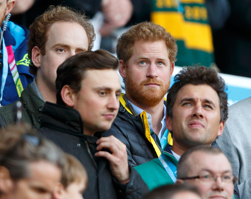 Tom Inskip, Charlie van Straubenzee, Prince Harry and Thomas van Straubenzee attend the 2015 Rugby World Cup Semi Final match between Argentina and Australia at Twickenham Stadium on October 25, 2015 in London, England. (Max Mumby/Indigo—Getty Images)