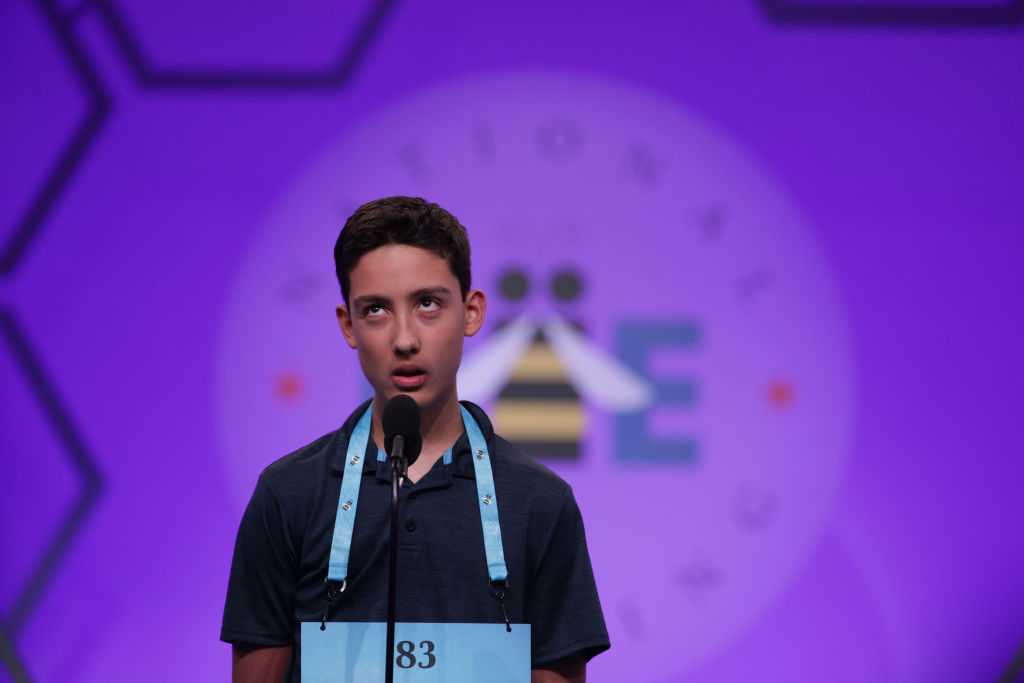 Elliott Husseman of Poway, California, tries to spell his word during round three of the Scripps National Spelling Bee at the Gaylord National Resort &amp; Convention Center May 28, 2019 in National Harbor, Maryland. (Alex Wong—Getty Images)