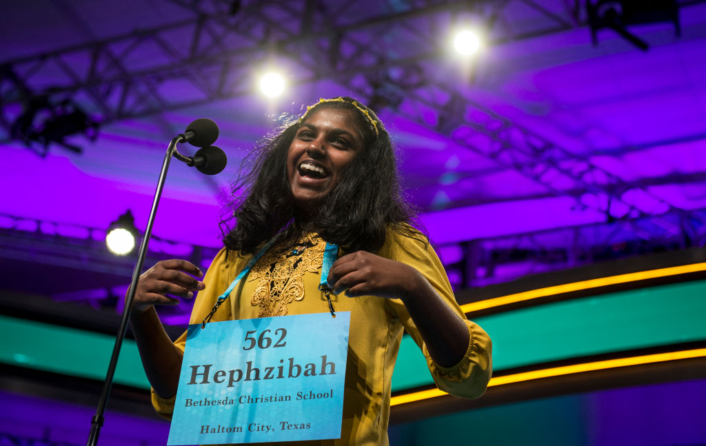 Hephzibah Sujoe, 13, of Fort Worth, Texas reacts after correctly spelling a word in the finals of the Scripps National Spelling Bee on Thursday May 30, 2019 in Oxon Hill, Md. (Congressional Quarterly&mdash;CQ-Roll Call,Inc.)
