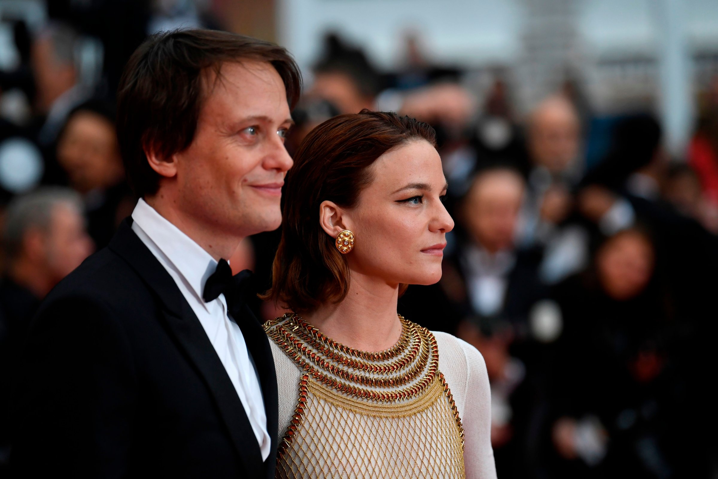 German actor August Diehl and Austrian actress Valerie Pachner arrive for the screening of the film "A Hidden Life" at the 72nd edition of the Cannes Film Festival on May 19, 2019.
