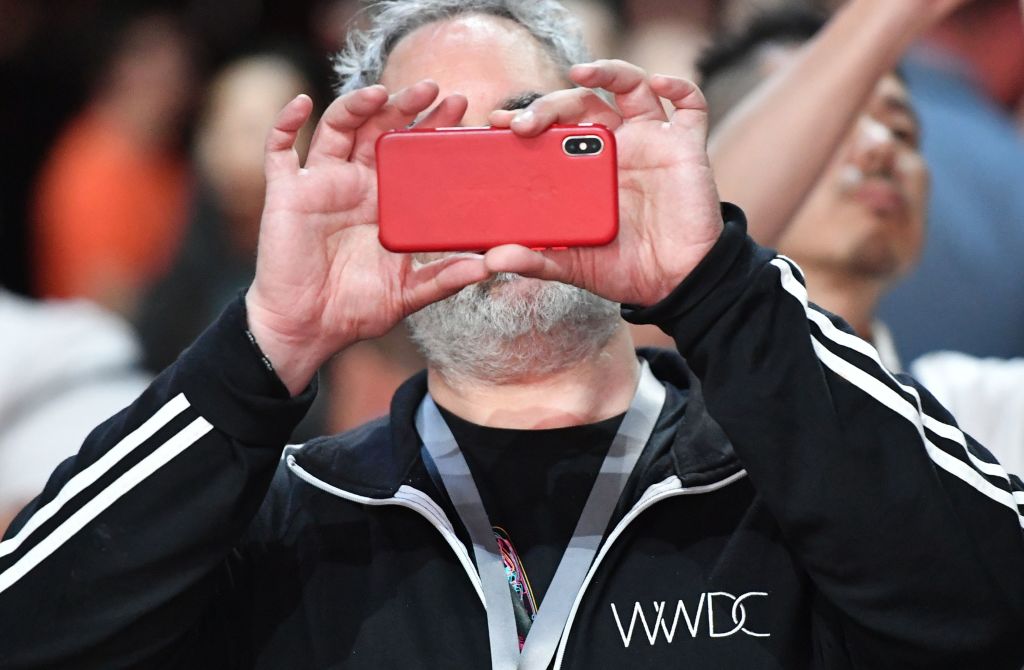 A man takes a photo before the start of Apple's Worldwide Developer Conference (WWDC) at the San Jose Convention Centerin San Jose, California on Monday, June 4, 2018. (Josh Edelson&mdash;AFP/Getty Images)