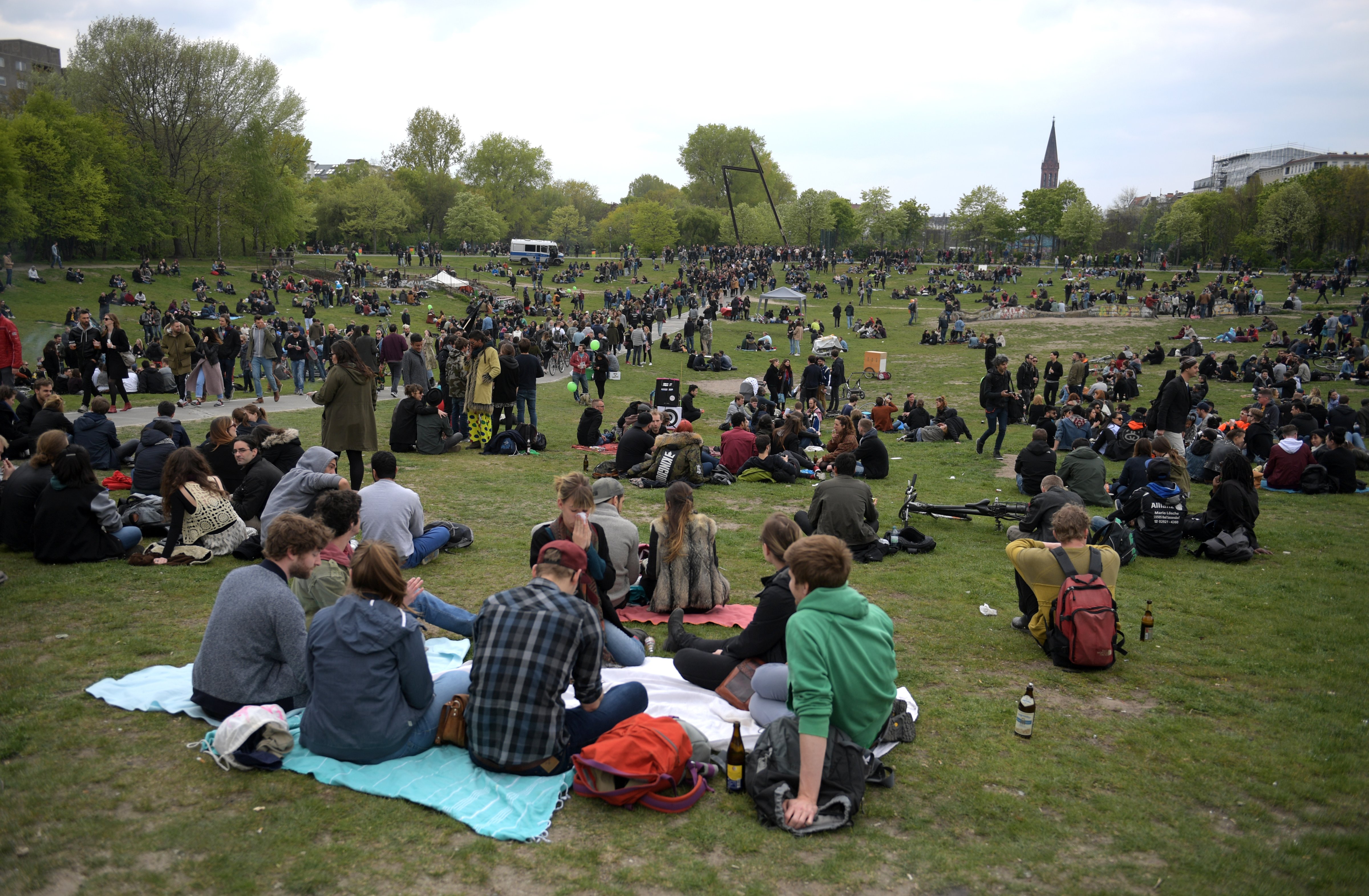 People sitting in Görlitzer Park in Kreuzberg, Berlin on May 1, 2017. (Britta Pedersen&mdash;dpa/AP Images)