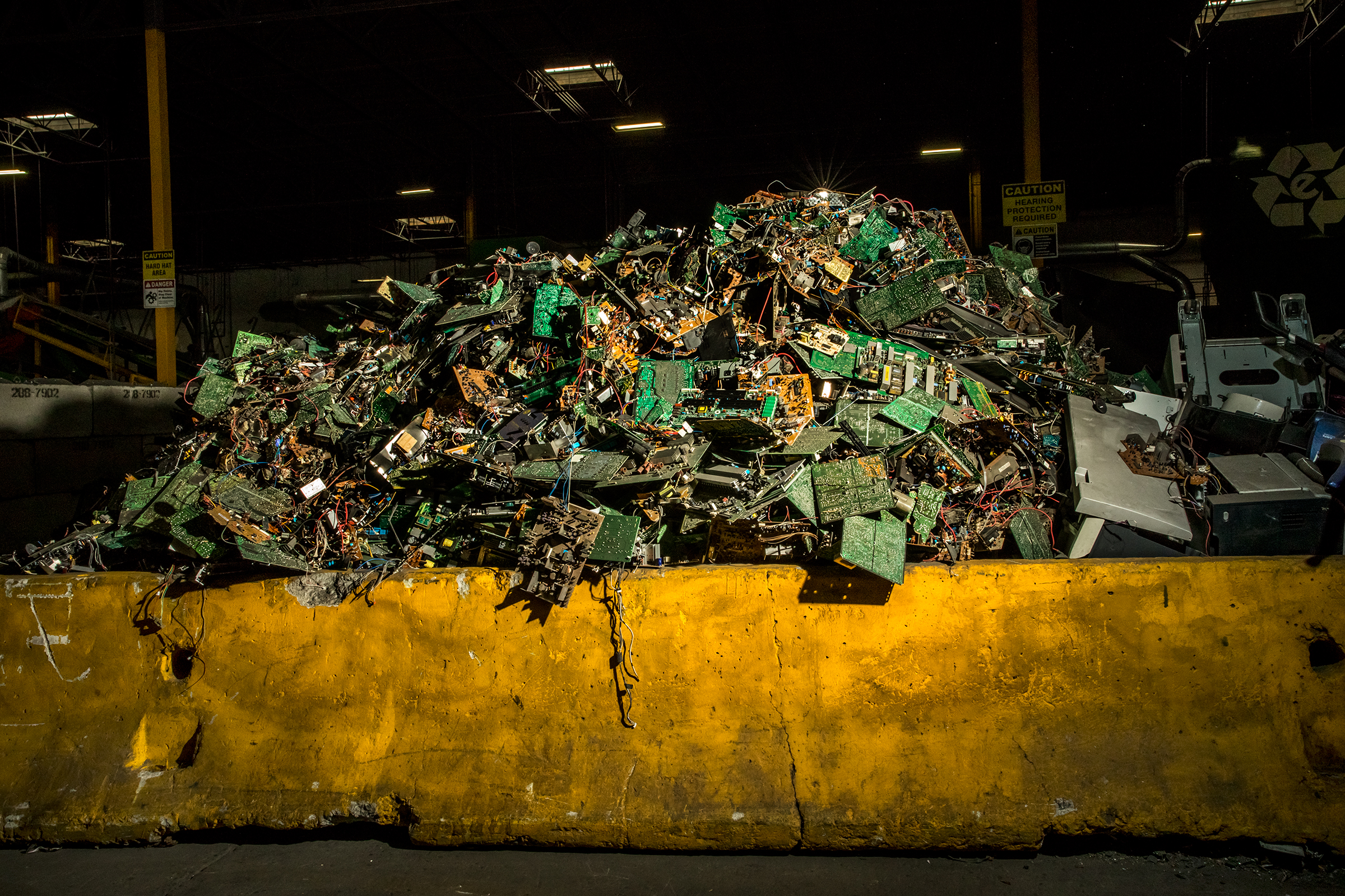 A heaping pile of circuit boards, which can be found in many modern electronics, at ERI's plant in Fresno in May. ERI separates them from their place of origin to be properly broken down and recycled. (Christie Hemm Klok for TIME)