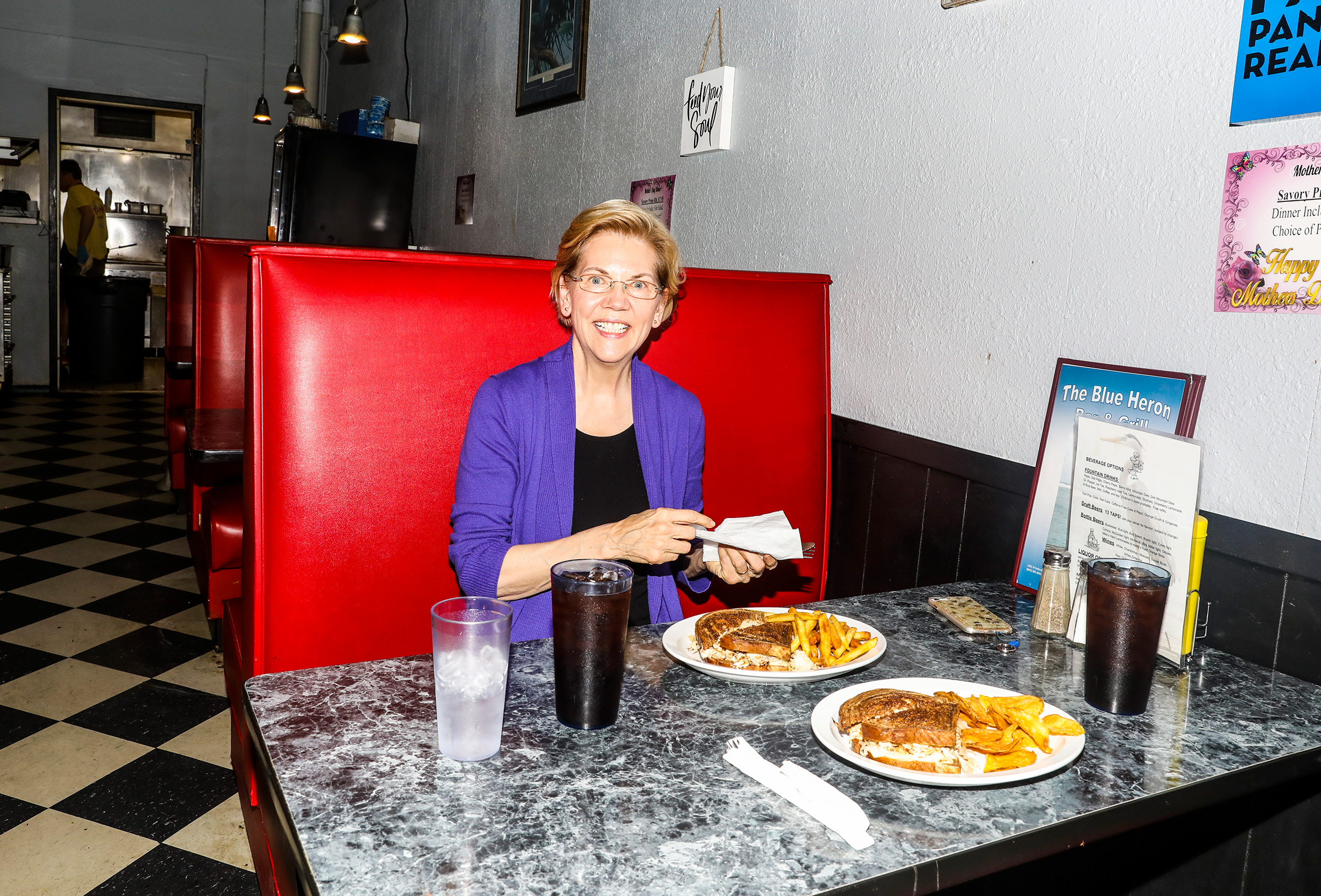 Warren stops for lunch at The Blue Heron in Mason City on May 4. (Krista Schlueter for TIME)