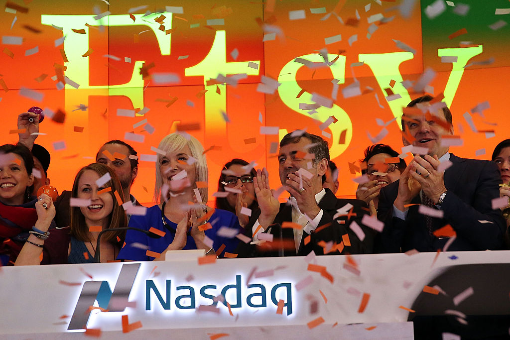 The CEO of the online marketplace Etsy, Chad Dickerson, stands with the CFO Kristina Salen on the floor of the Nasdaq as the company becomes a public company began under the ticker symbol "ETSY" on April 16, 2015, in New York City. (Photo by Spencer Platt/Getty Images) (Spencer Platt—Getty Images)