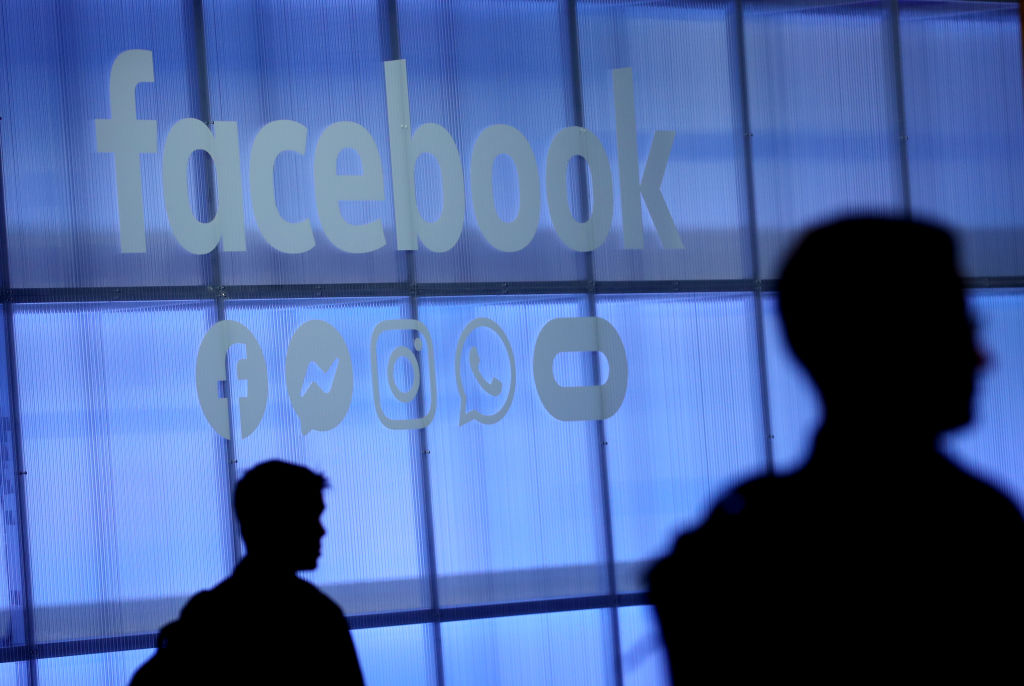 The Facebook logo is displayed during the F8 Facebook Developers conference on April 30, 2019 in San Jose, California