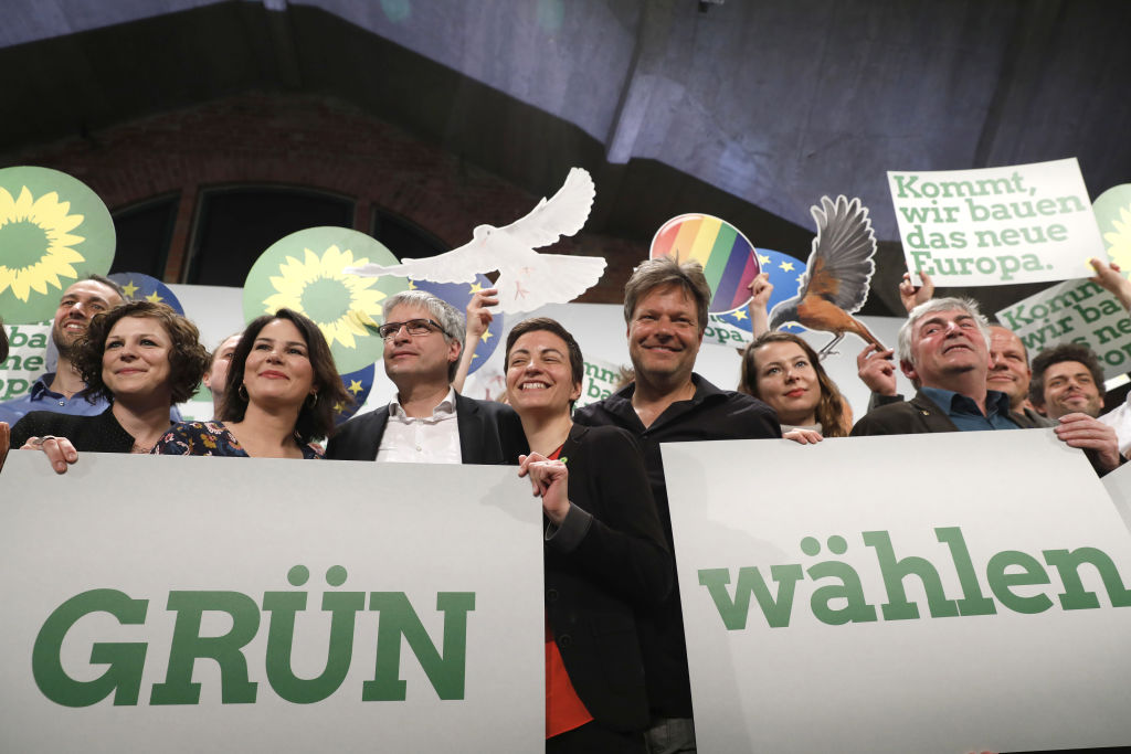 Annalena Baerbock, 2 from L, Chairwoman, Sven Giegold,l, Ska Keller, co-lead candidates for the German Greens Party, Robert Habeck, Chairman and other members of the party wave to delegates at a Greens party congress on May 18, 2019 in Berlin, Germany (Michele Tantussi—Getty Images)