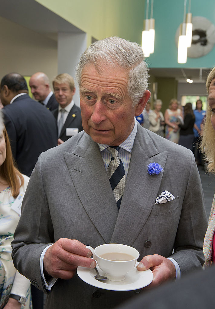 Prince of Wales drinks a cup of tea during a visit to a Marie Curie Cancer Care Hospice on June 21, 2013 in Solihull, U.K. (Adrian Sterratt/PA Pool -- Getty Images)
