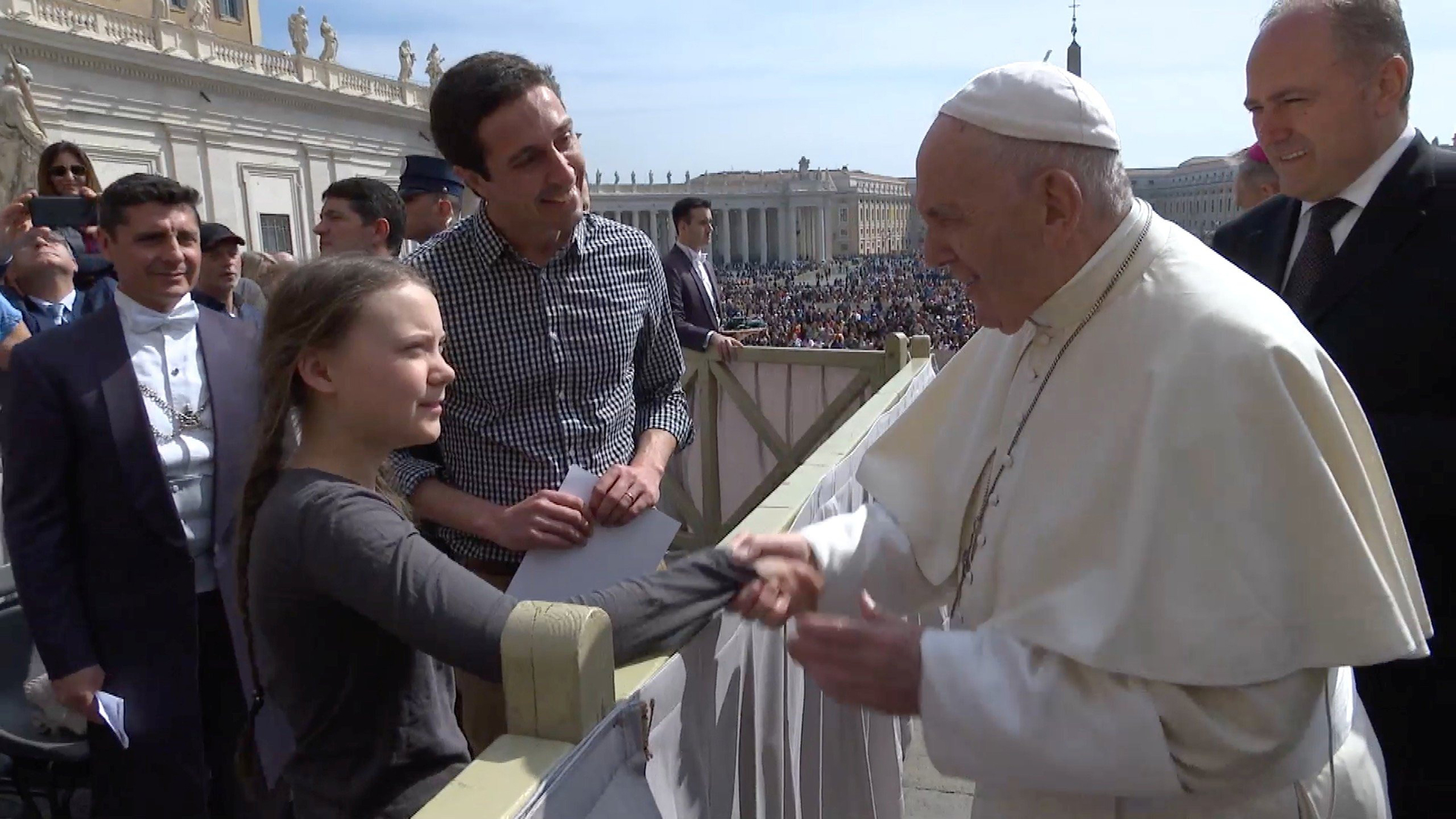 Thunberg greeting Pope Francis on April 17 (Vatican Media/Reuters)