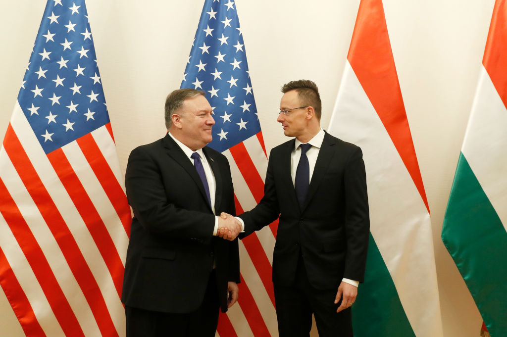 U.S. Secretary of State Mike Pompeo shakes hands with Hungarian Foreign Minister Peter Szijjarto on February 11, 2019 in Budapest, Hungary. (Laszlo Balogh—Getty Images)