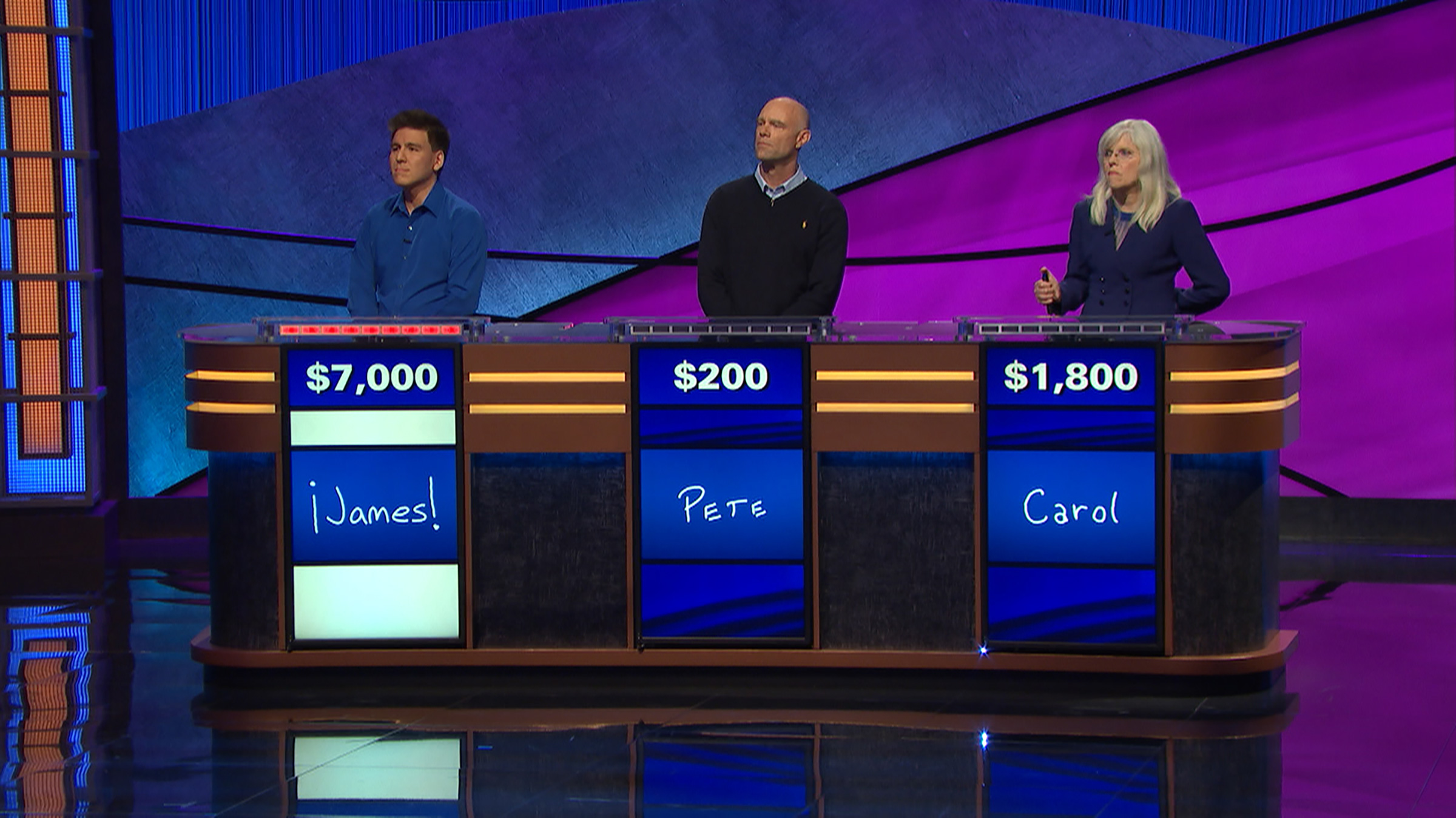 James Holzhauer, at left, on Jeopardy! (Courtesy Jeopardy Productions, Inc.)