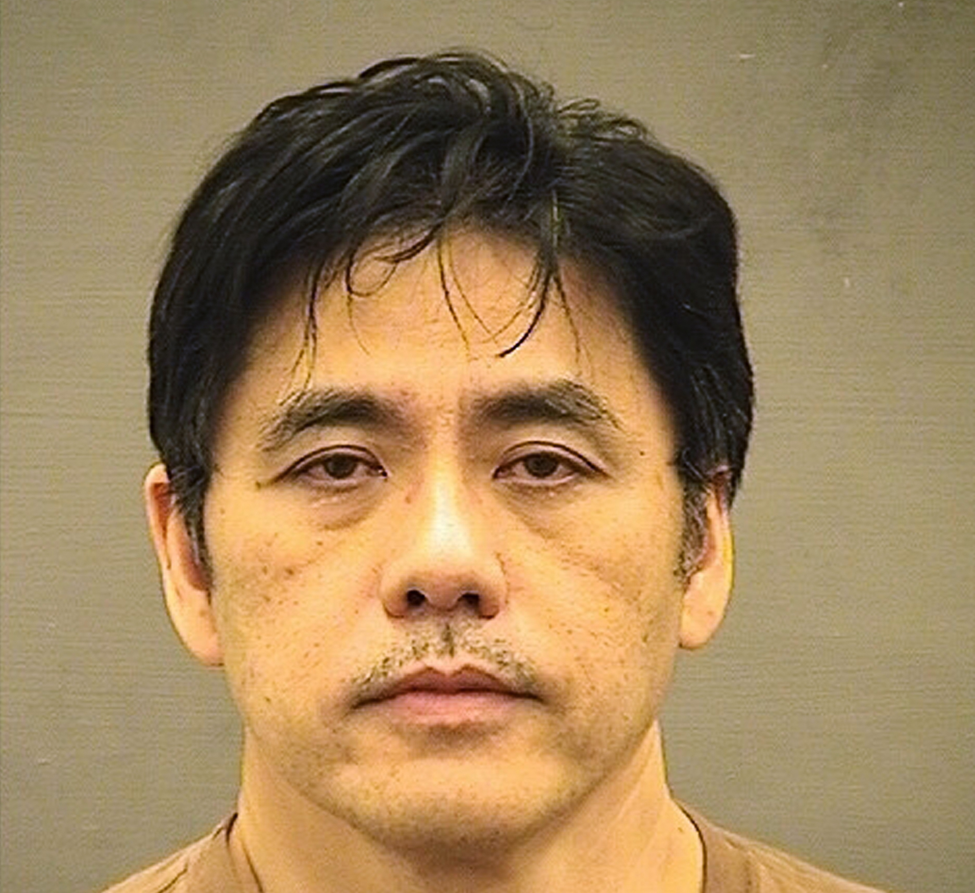 This undated photo provided by the Alexandria Sheriff’s Office shows Jerry Chun Shing Lee; the former CIA officer pleaded guilty to conspiring with China to commit espionage on May 1, 2019. (Alexandria Sheriff’s Office&mdash;AP)