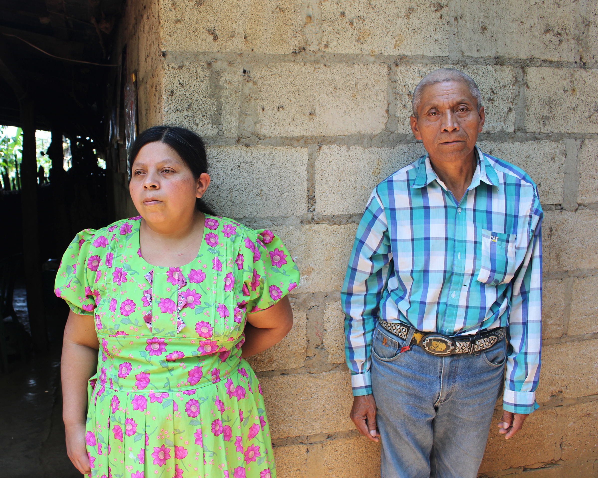 Juan de León Gutiérrez's parents, Tránsito Gutiérrez and Tanerjo de Léon, outside their home in El Tesoro, Guatemala. (Anna-Catherine Brigida)