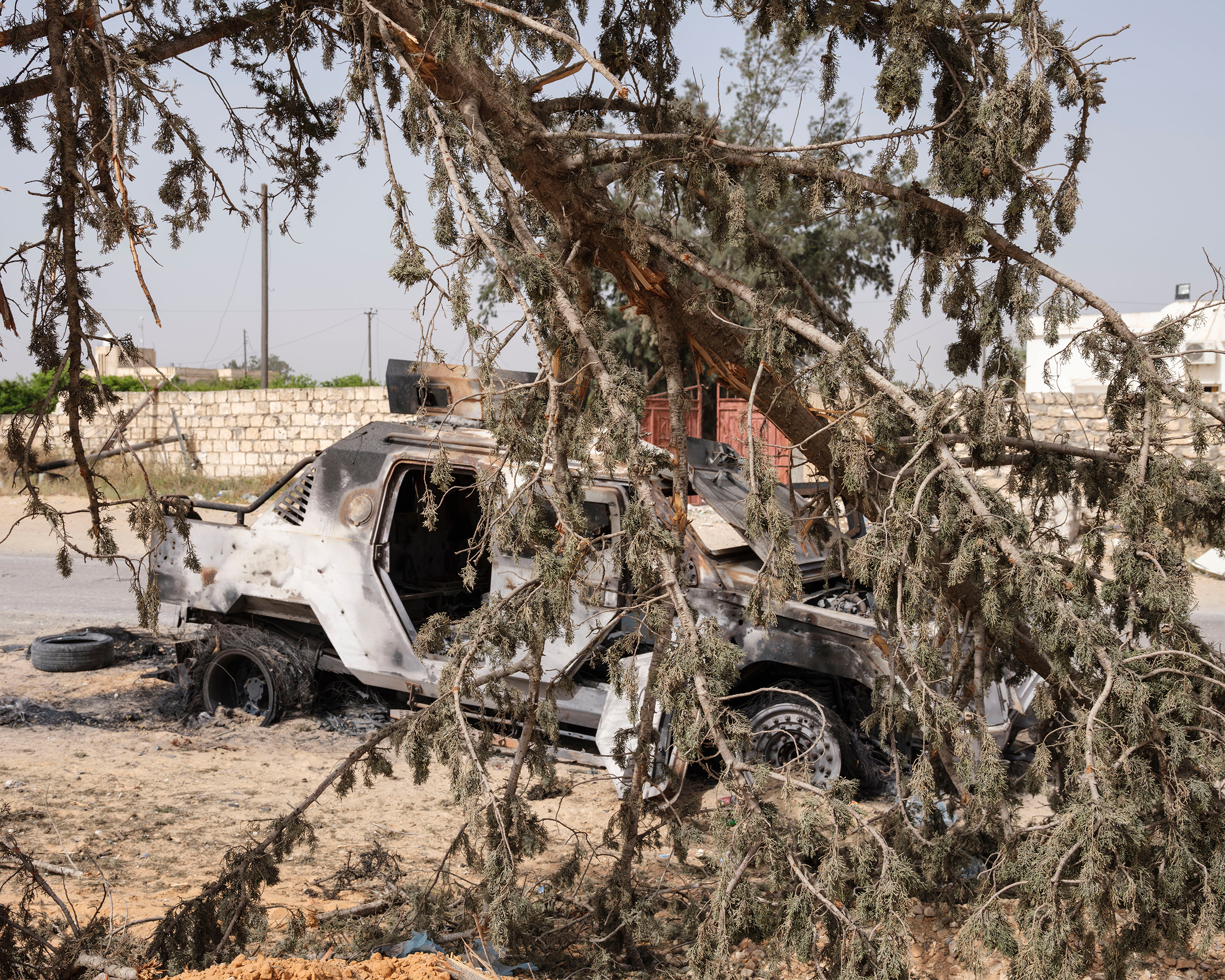 An armored vehicle of fighters loyal to Haftar was destroyed by GNA troops in the Ain Zara area in April. (Lorenzo Meloni—Magnum Photos)
