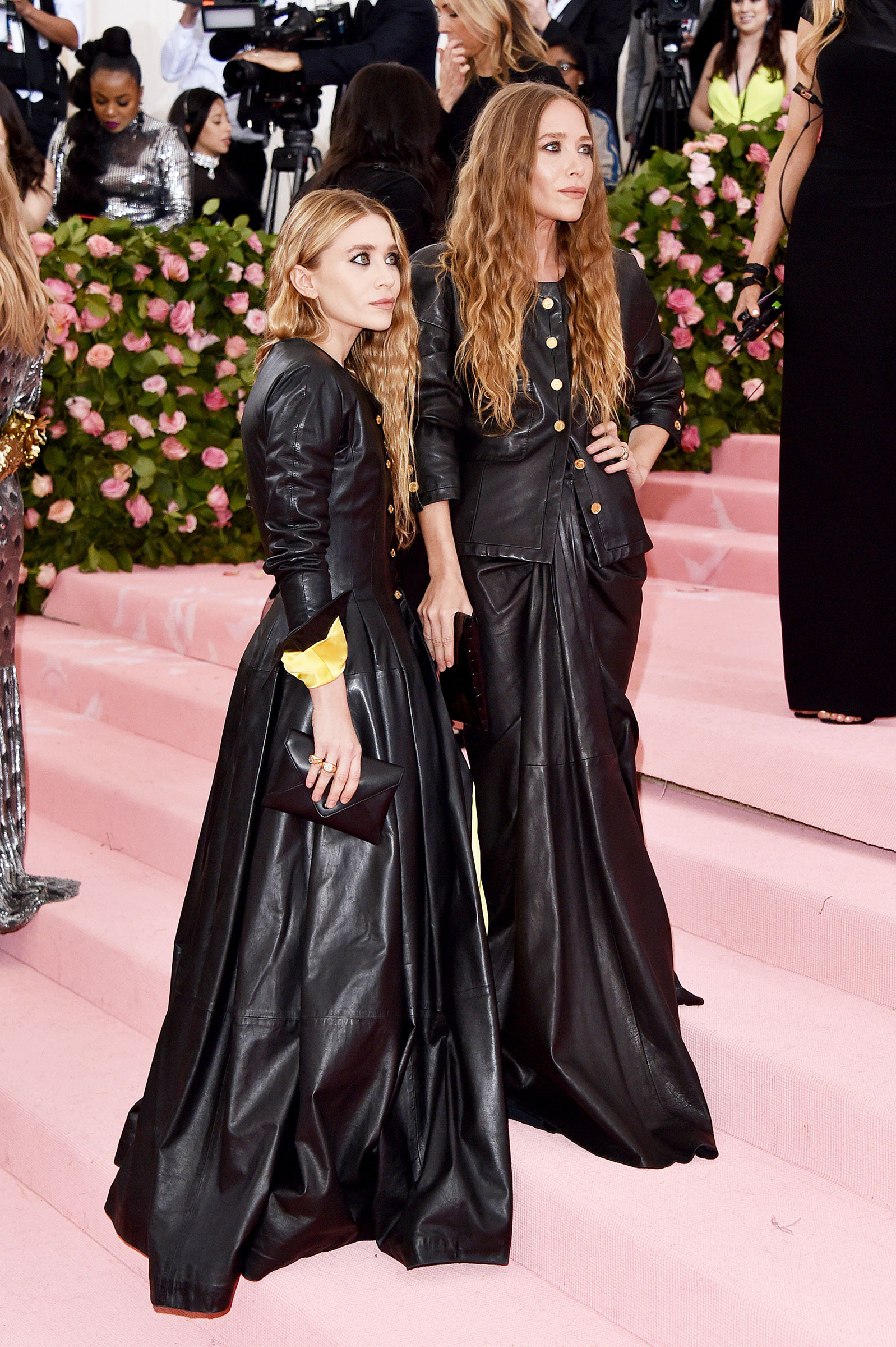 Mary-Kate Olsen and Ashley Olsen attend The 2019 Met Gala Celebrating Camp