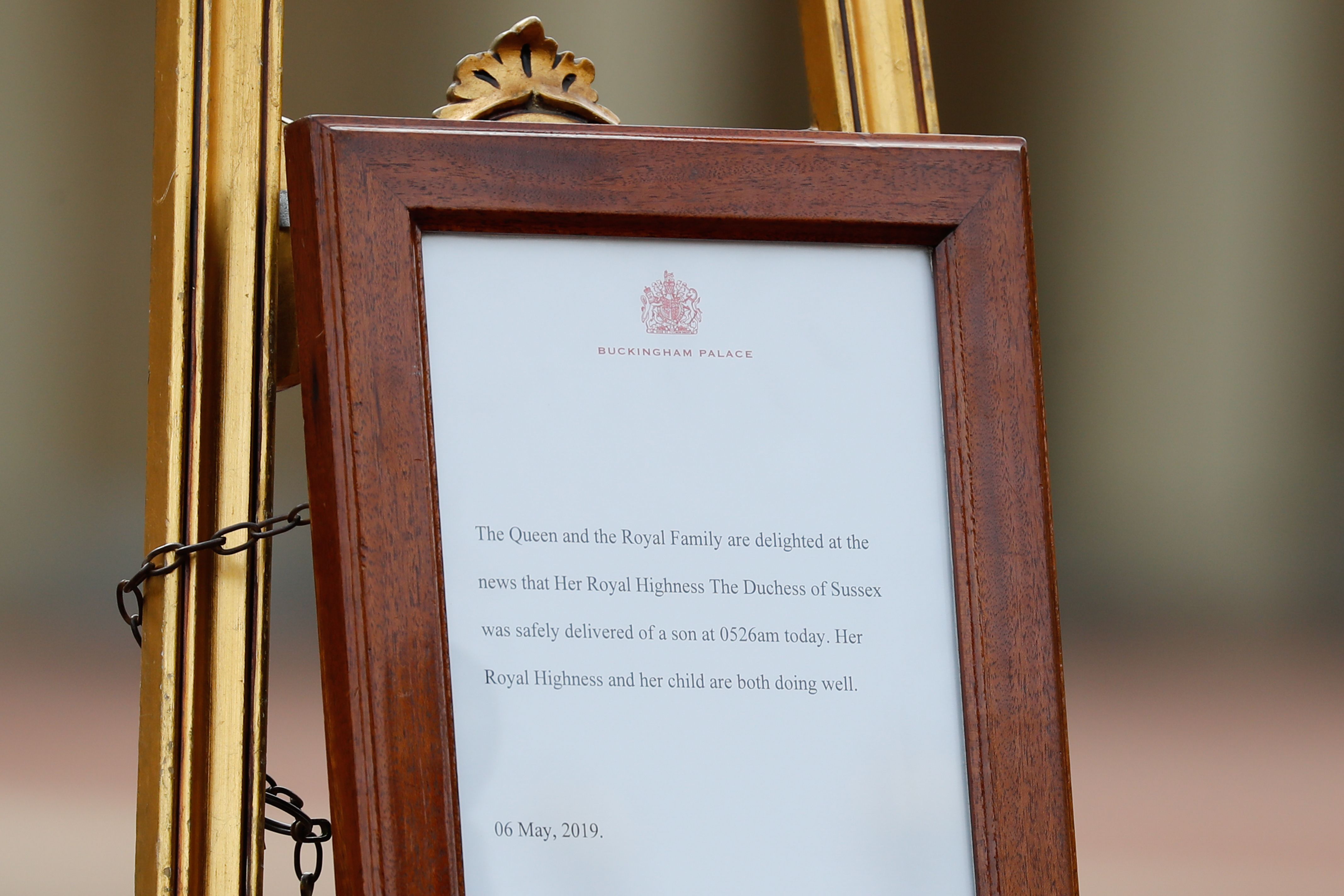 A picture shows an official notice set up on an easel at the gates of Buckingham Palace in London on May 6, 2019 announcing the birth of a son to Britain's Prince Harry, Duke of Sussex and Meghan, Duchess of Sussex. (TOLGA AKMEN—AFP/Getty Images)