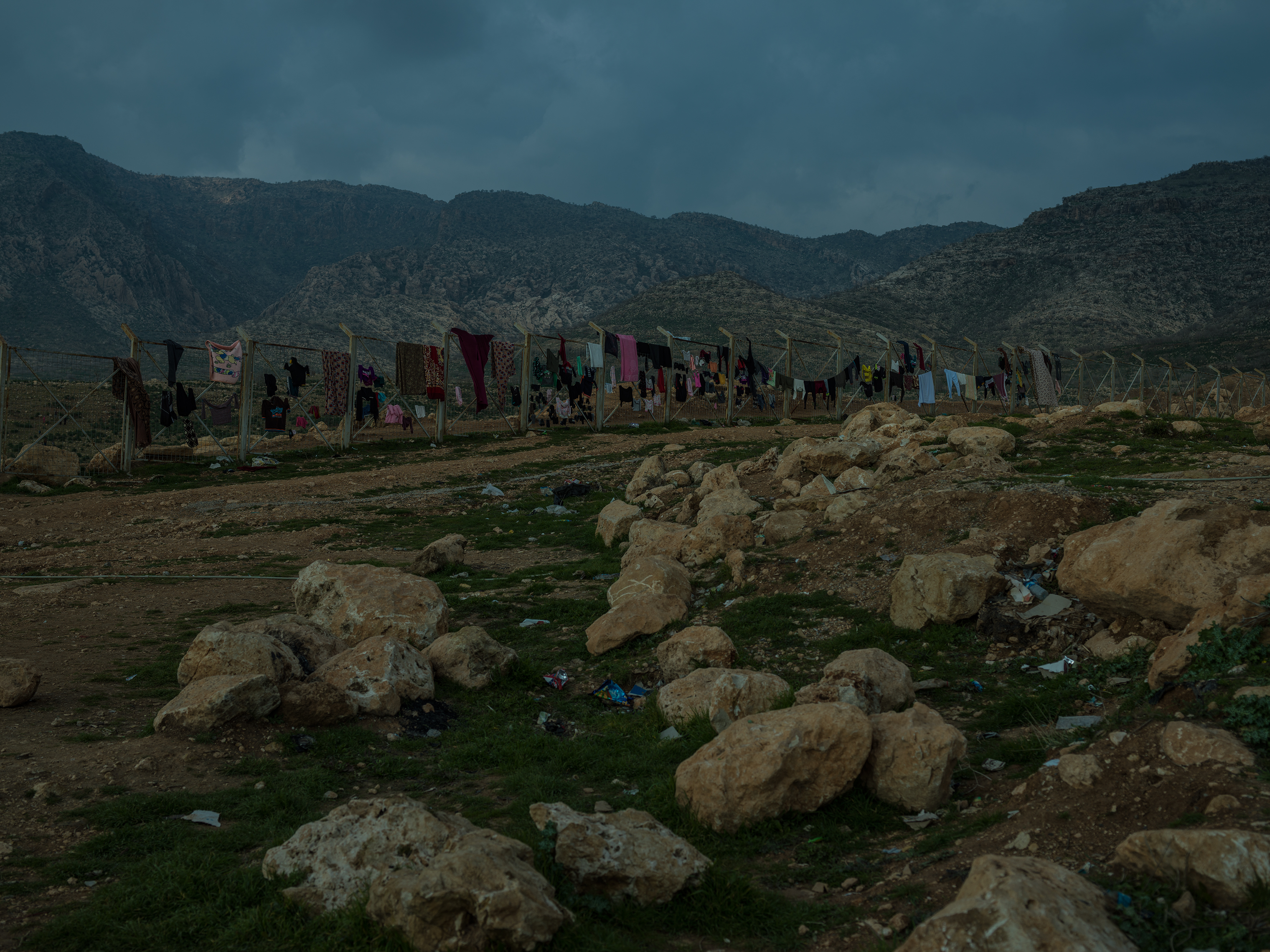 Clothes dry on a fence at a camp for displaced Yezidis near Duhok. (Newsha Tavakolian—Magnum Photos for TIME)