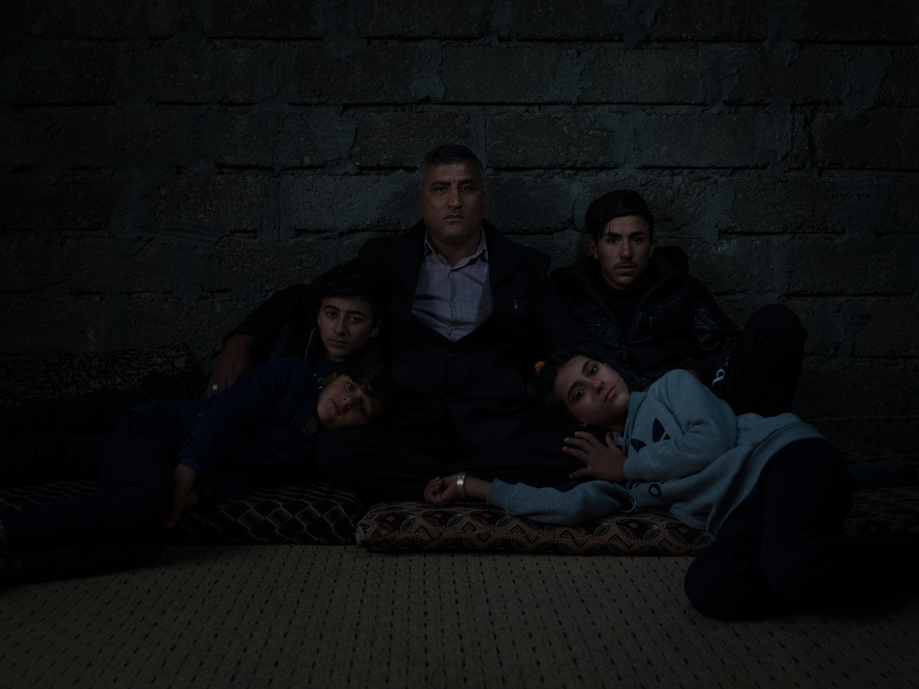 Khayri Abdullah Massi ransomed family members, but his wife went back to raise the child she had by her "ISIS husband." (Newsha Tavakolian—Magnum Photos for TIME)