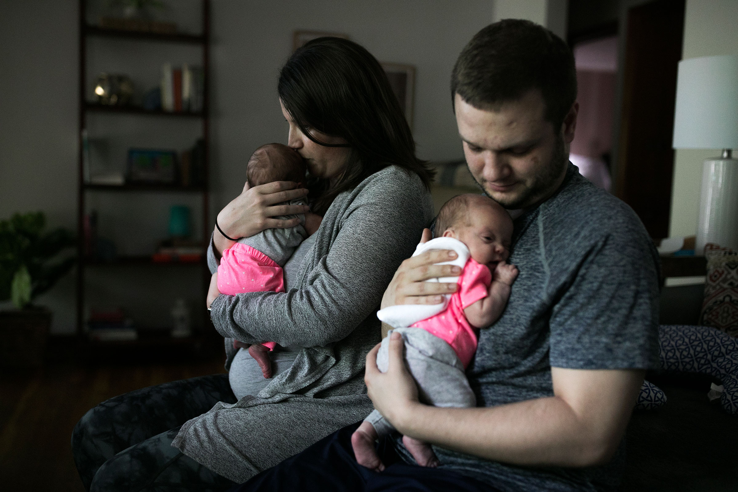 Morgan Lyles and her fiancé Chris comfort 10-week-old twins Maura and Lena in their Columbus, Ohio, home (Maddie McGarvey for TIME)