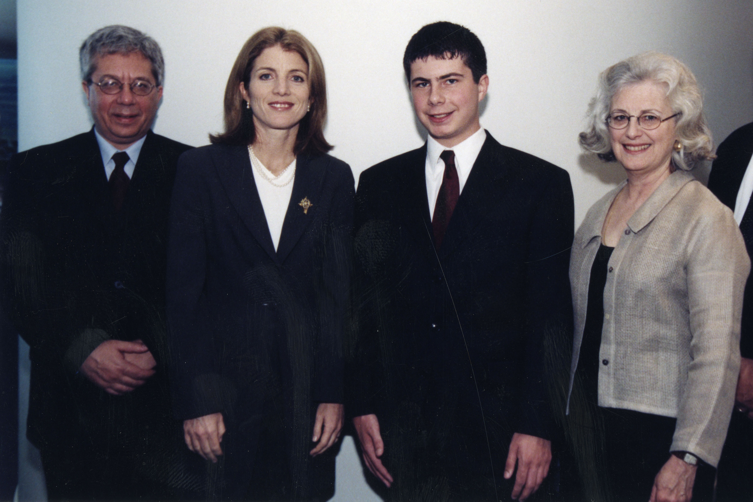 Buttigieg and his parents pose with Caroline Kennedy at the JFK Library in 2000. His high school essay on Senator Bernie Sanders won first place in the JFK Profiles in Courage contest. (John F. Kennedy Library Foundation)