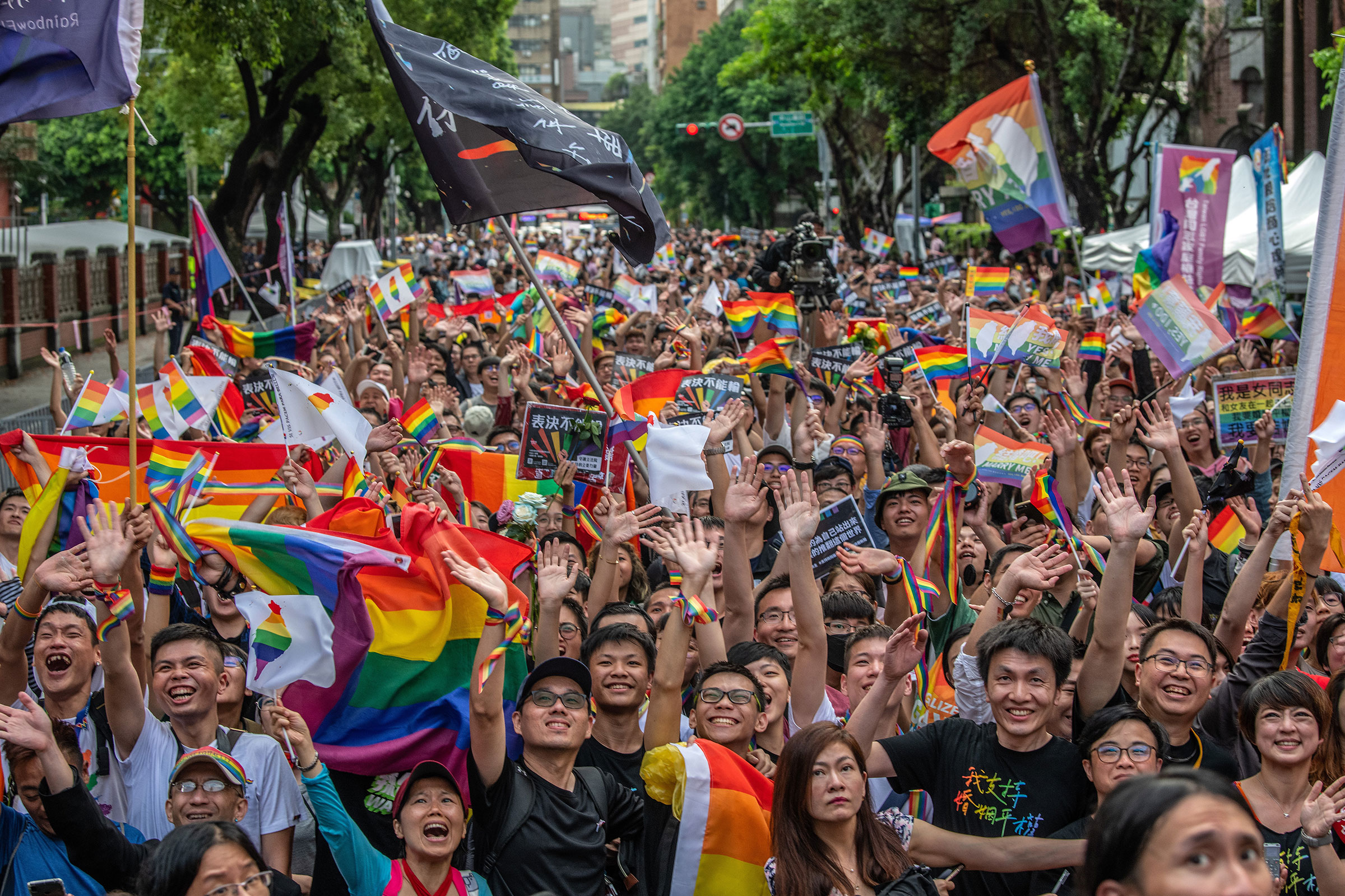 People celebrate after Taiwan's parliament voted to legalize same-sex marriage on May 17, 2019 in Taipei, Taiwan. (Carl Court—Getty Images)