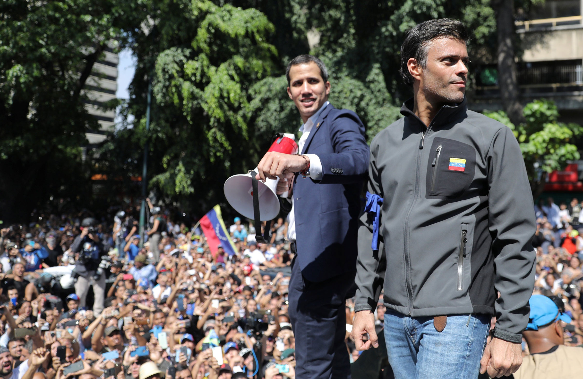 Venezuelan opposition leaders Guaido and Lopez address supporters in Caracas