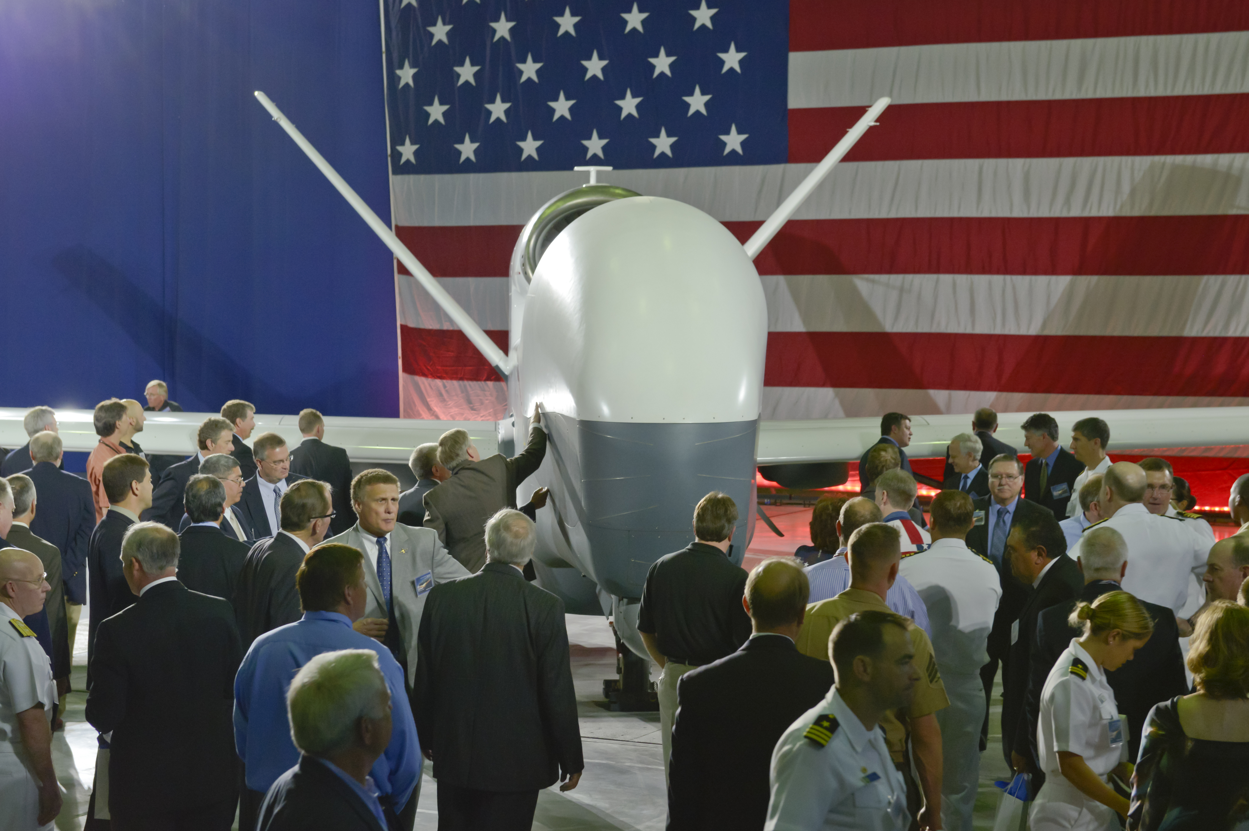 Northrop Grumman unveils the U.S. Navy MQ-4C Broad Area Maritime Surveillance (BAMS) unmanned aircraft system during a ceremony at the Northrop Grumman Palmdale Calif. manufacturing facility. (Northrup Grumman—U.S. Navy)