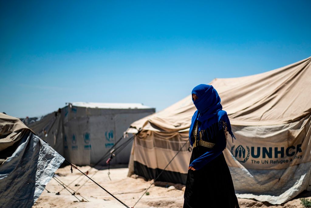 A woman walks inside al-Hol camp for displaced people in northeastern Syria on May 28, 2019. (Delil Souleiman&mdash;AFP/Getty Images)