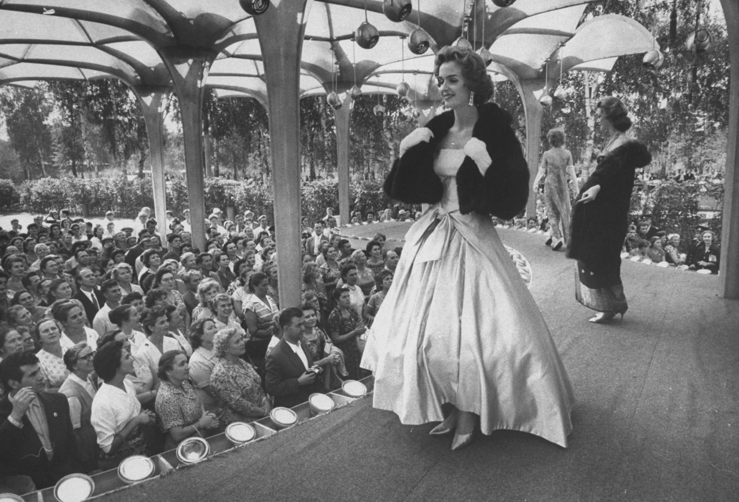 A woman models a gown at a special showing of American fashions in Moscow, 1959