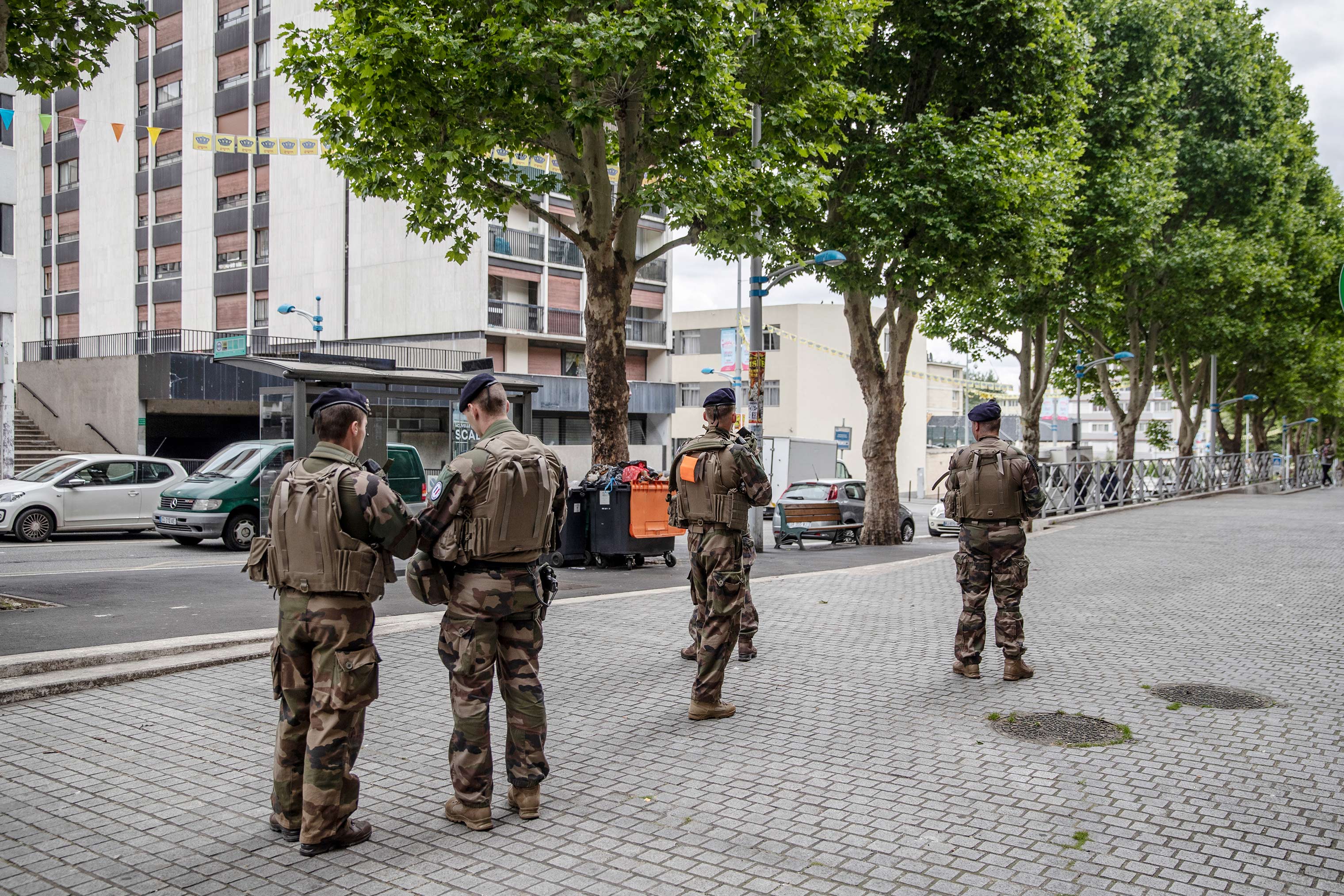 French soldiers patrol streets in the Jewish quarter of Sarcelles, France. Jews and Arab immigrants have lived alongside each other in the area for decades. (Magnus Wennman for TIME)