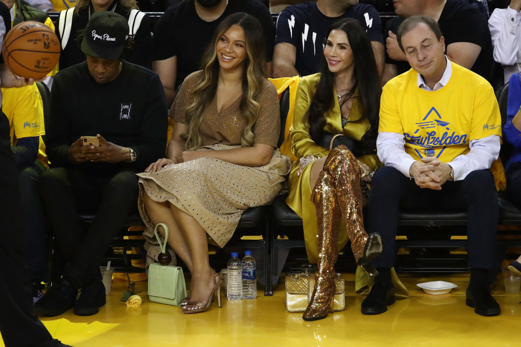 (L-R) Jay-Z, Beyonce, Nicole Curran and Joseph S. Lacob attend Game Three of the 2019 NBA Finals between the Golden State Warriors and the Toronto Raptors at ORACLE Arena on June 05, 2019 in Oakland, California. (Ezra Shaw&mdash;Getty Images)