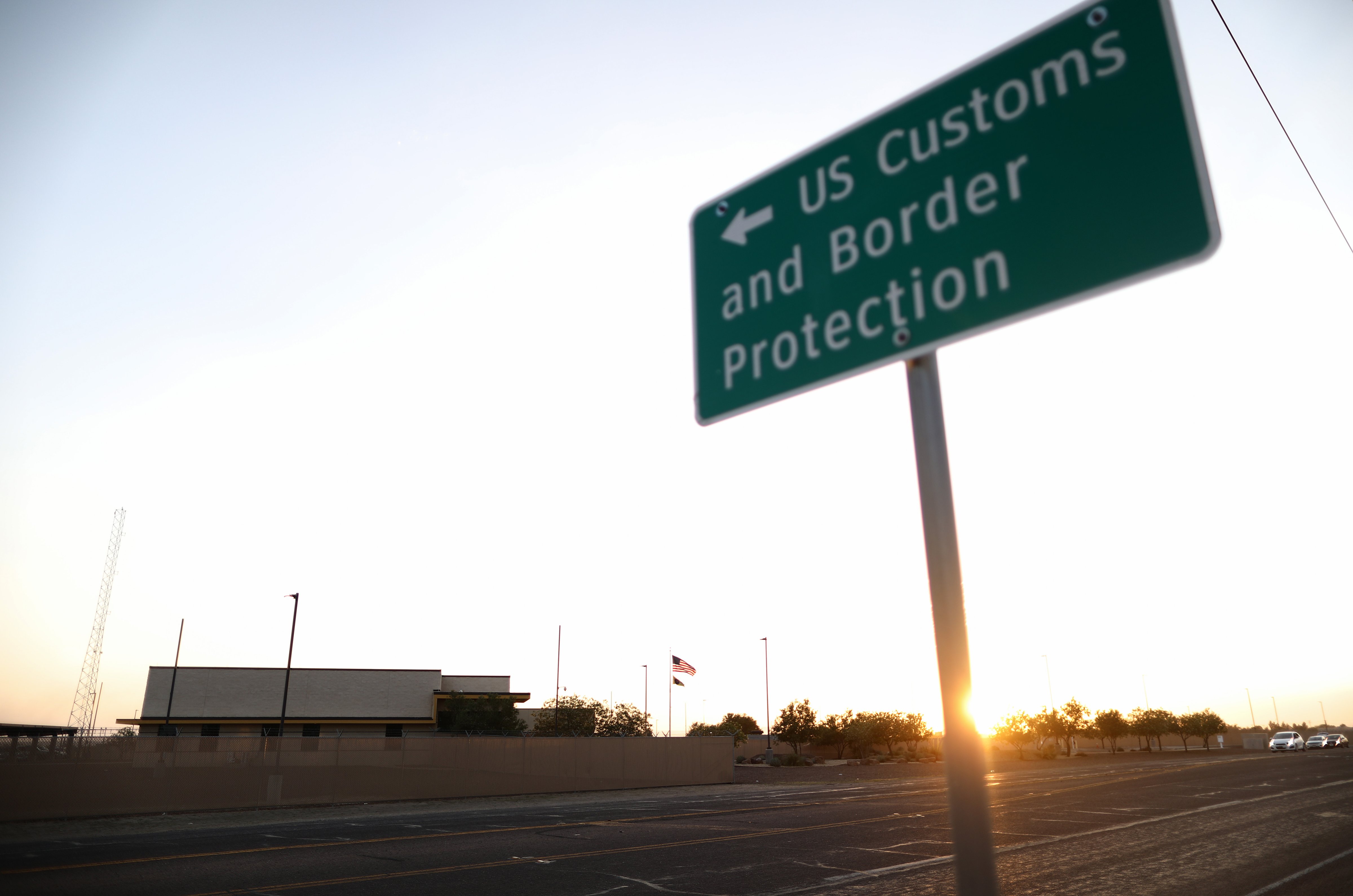 A U.S. Customs and Border Protection (CBP) sign is posted outside the U.S. Border Patrol station (L) where lawyers reported that detained migrant children were held unbathed and hungry on June 25, 2019 in Clint, Texas. (Mario Tama—Getty Images)