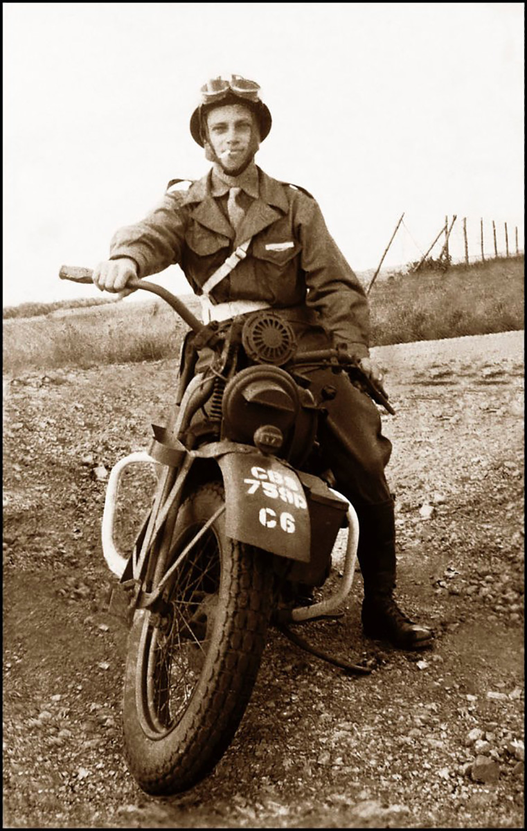 Pfc Norman Riggsby sitting on his Harley Davidson during the European campaign. After receiving wounds in Normandy, Riggsby transferred to the Military Police. (The National WWII Museum)