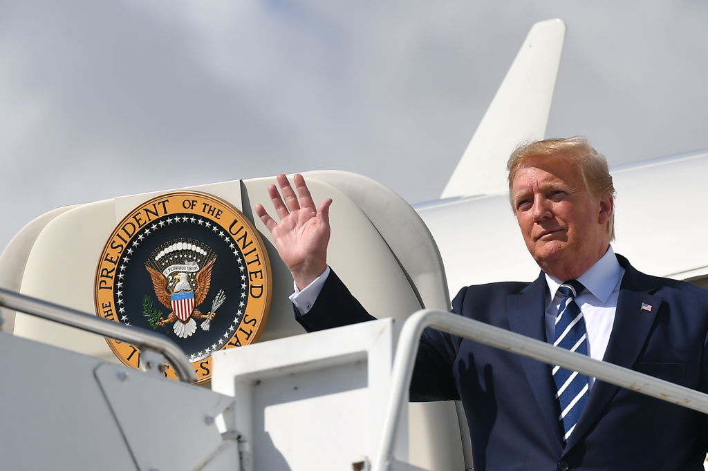President Donald Trump waves as he disembarks Air Force One upon arrival at Shannon Airport in Shannon, Ireland on June 5, 2019. (MANDEL NGAN&mdash;AFP/Getty Images)