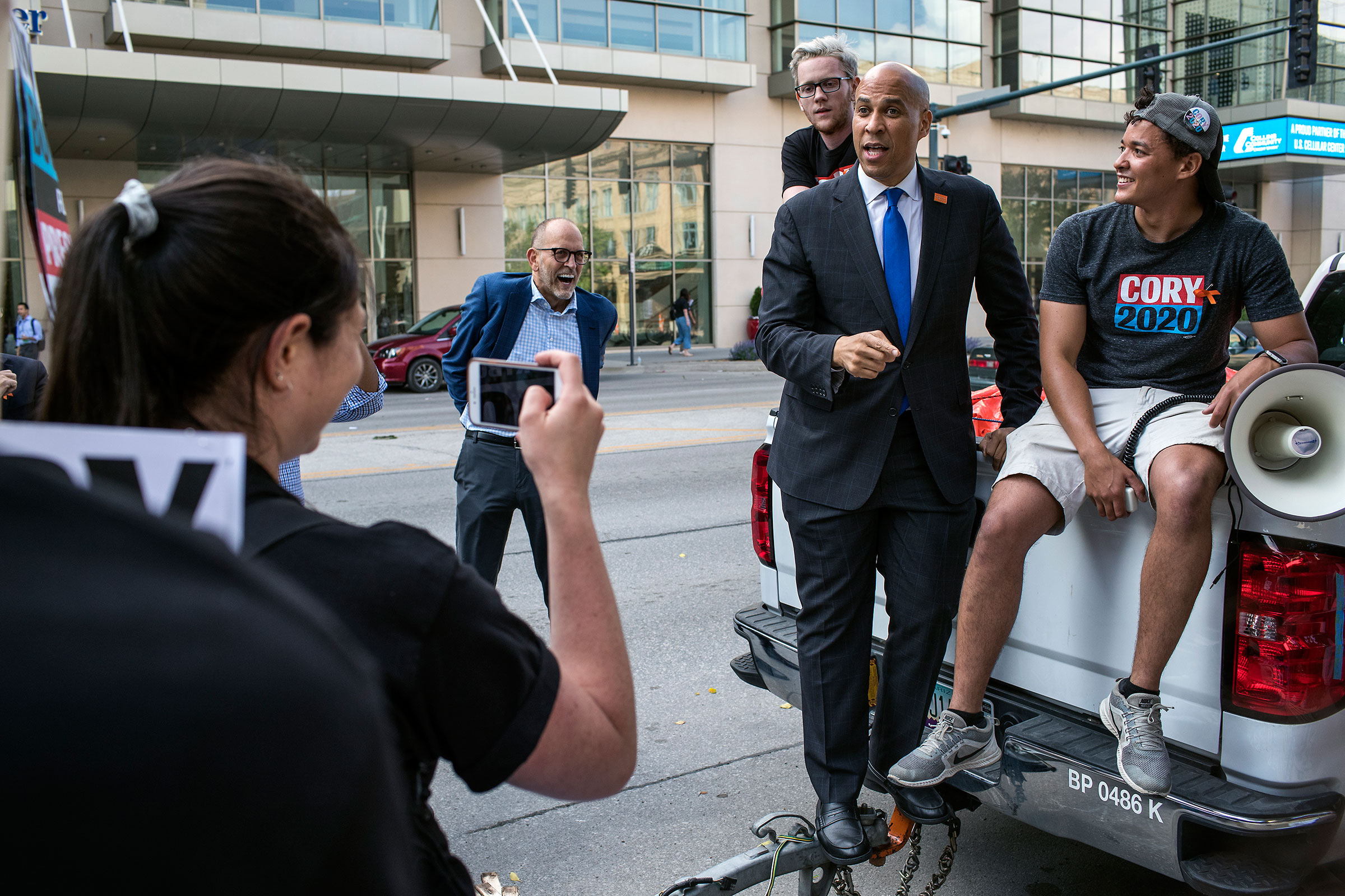 Booker speaks with supporters after the Democratic Hall of Fame event in Cedar Rapids, Iowa on June 9. (Danny Wilcox Frazier—VII for TIME)