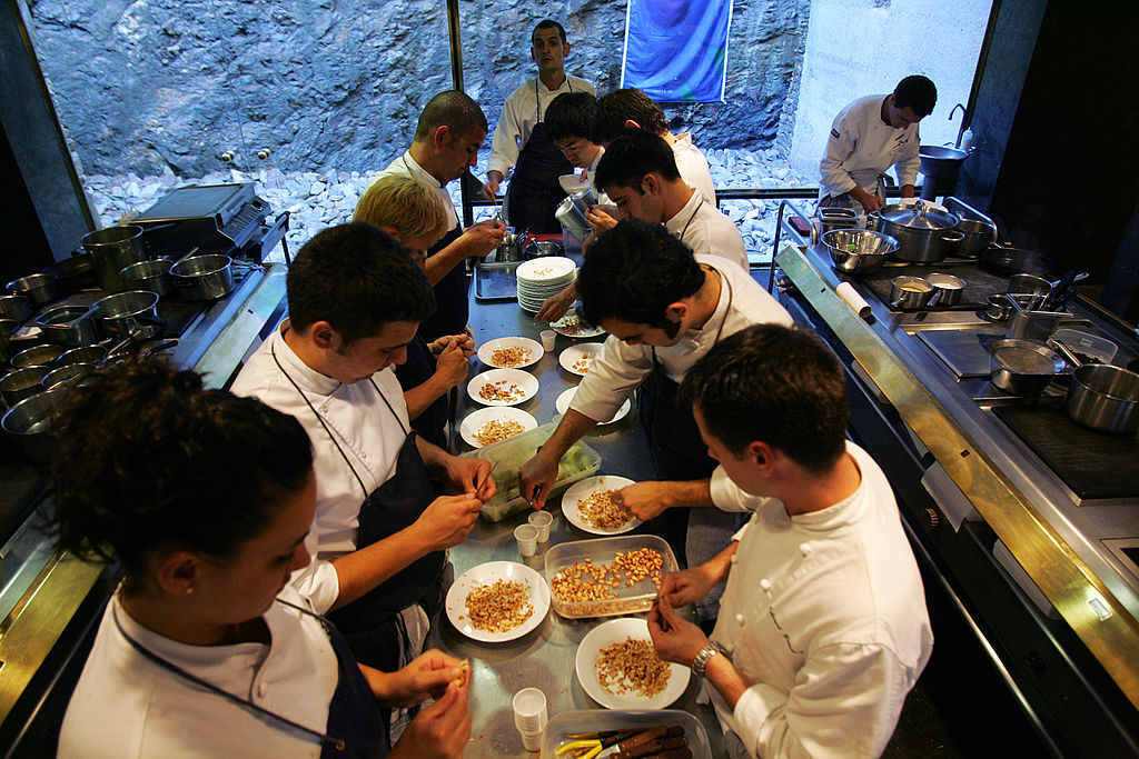 Kitchen assistant's of Spanish cook Ferran Adria are seen working in the kitchen of restaurant "El Bulli" on June 16, 2007  in Roses, Spain. El Bulli restaurant has been scored as the world's best restaurant in the World's 50 Best Restaurants 2009,. For the fourth year in a row Ferran Adria topped the list. (Samuel Aranda—Getty Images)