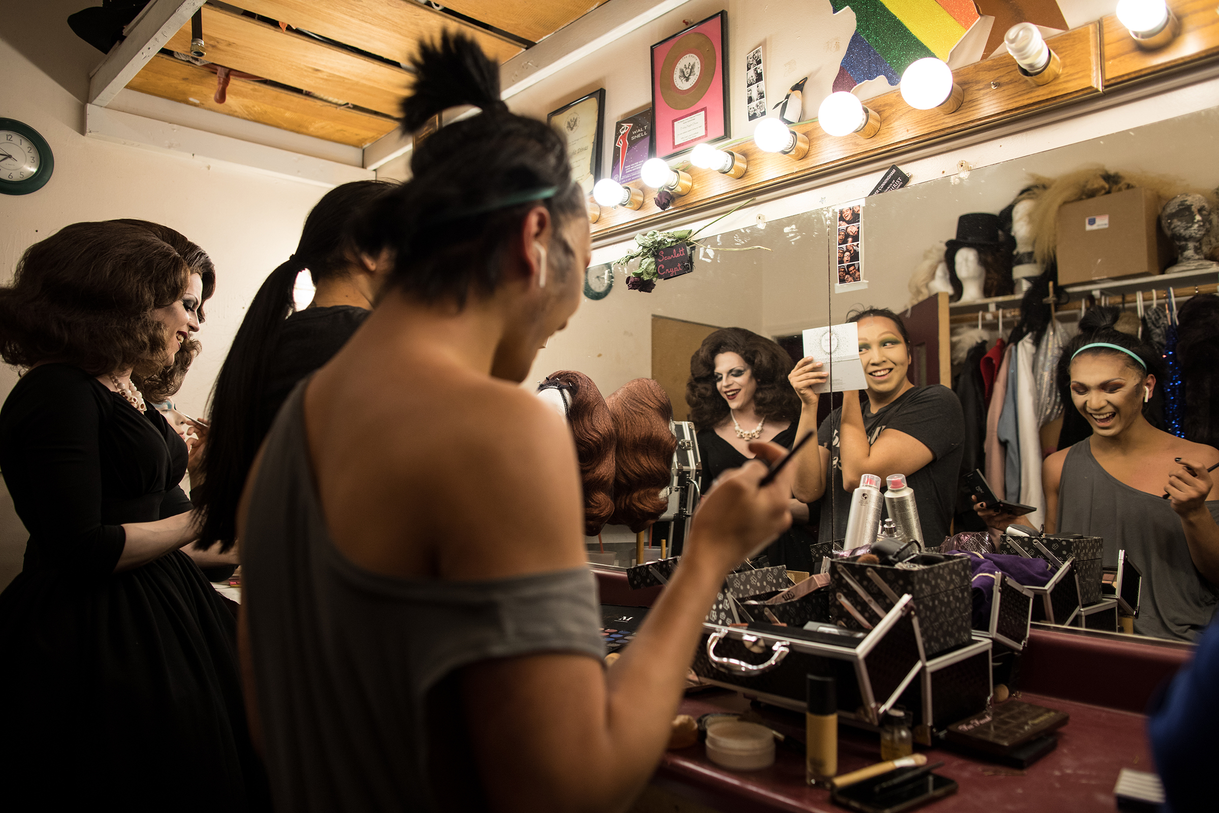 Drag Queens Scarlett Crypt, Lady Fairchild, and Venus Vixen get ready backstage at Mad Myrna's. (Ash Adams for TIME)